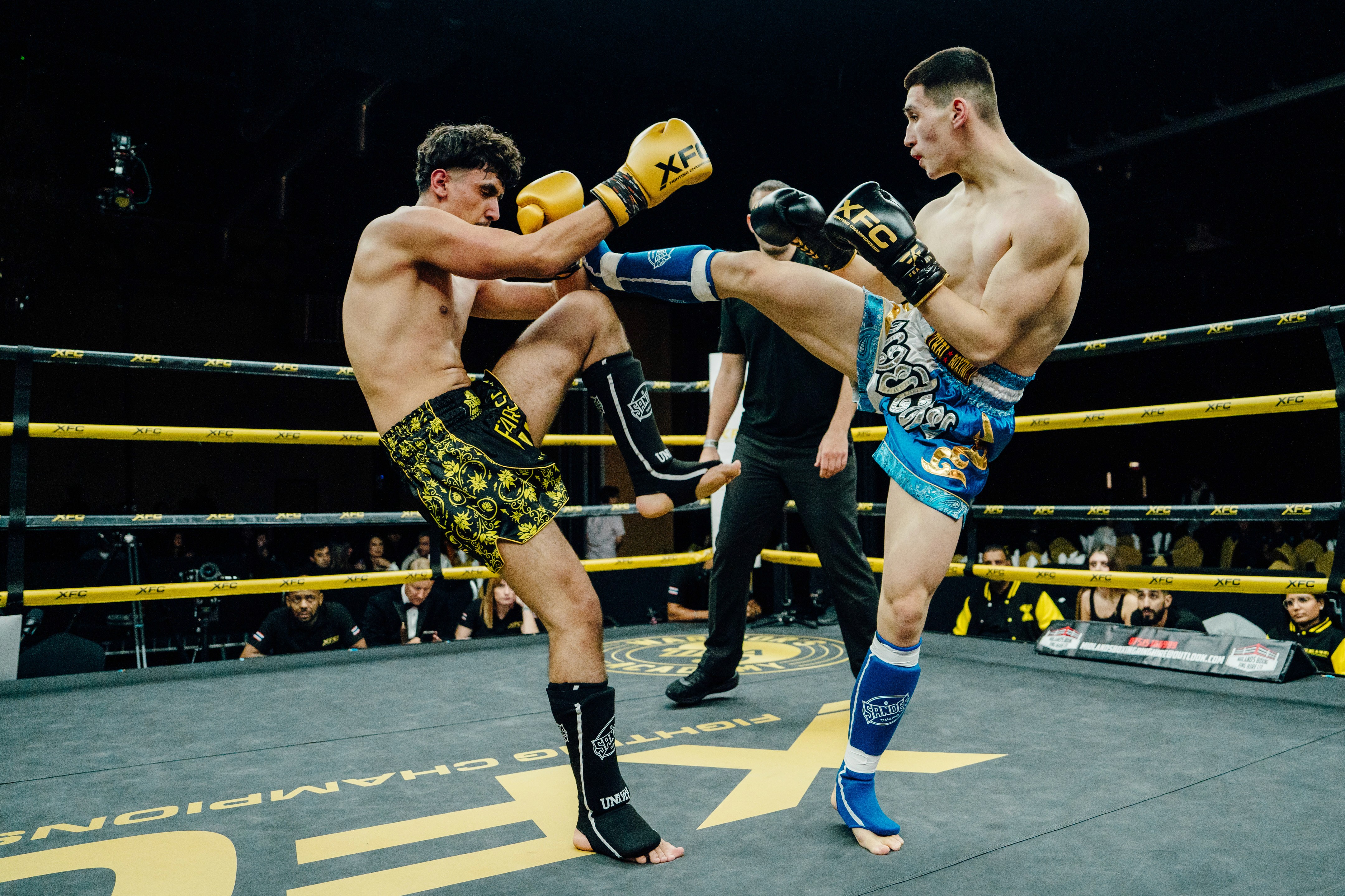 Two fighters sparring during a Muay Thai class at Fearless MMA