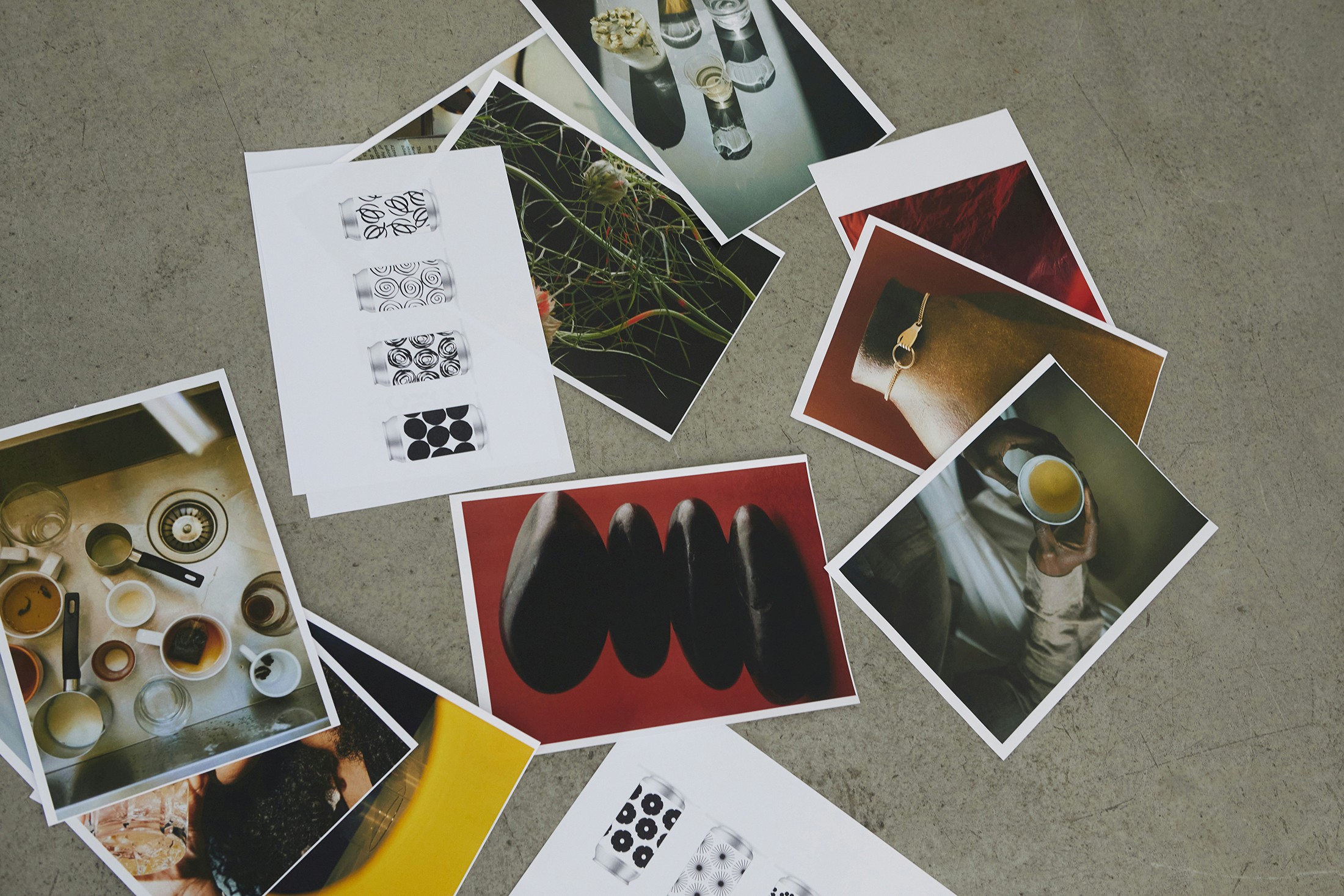 A collection of printed visuals representing different design concepts for art direction, branding, and social media campaigns.