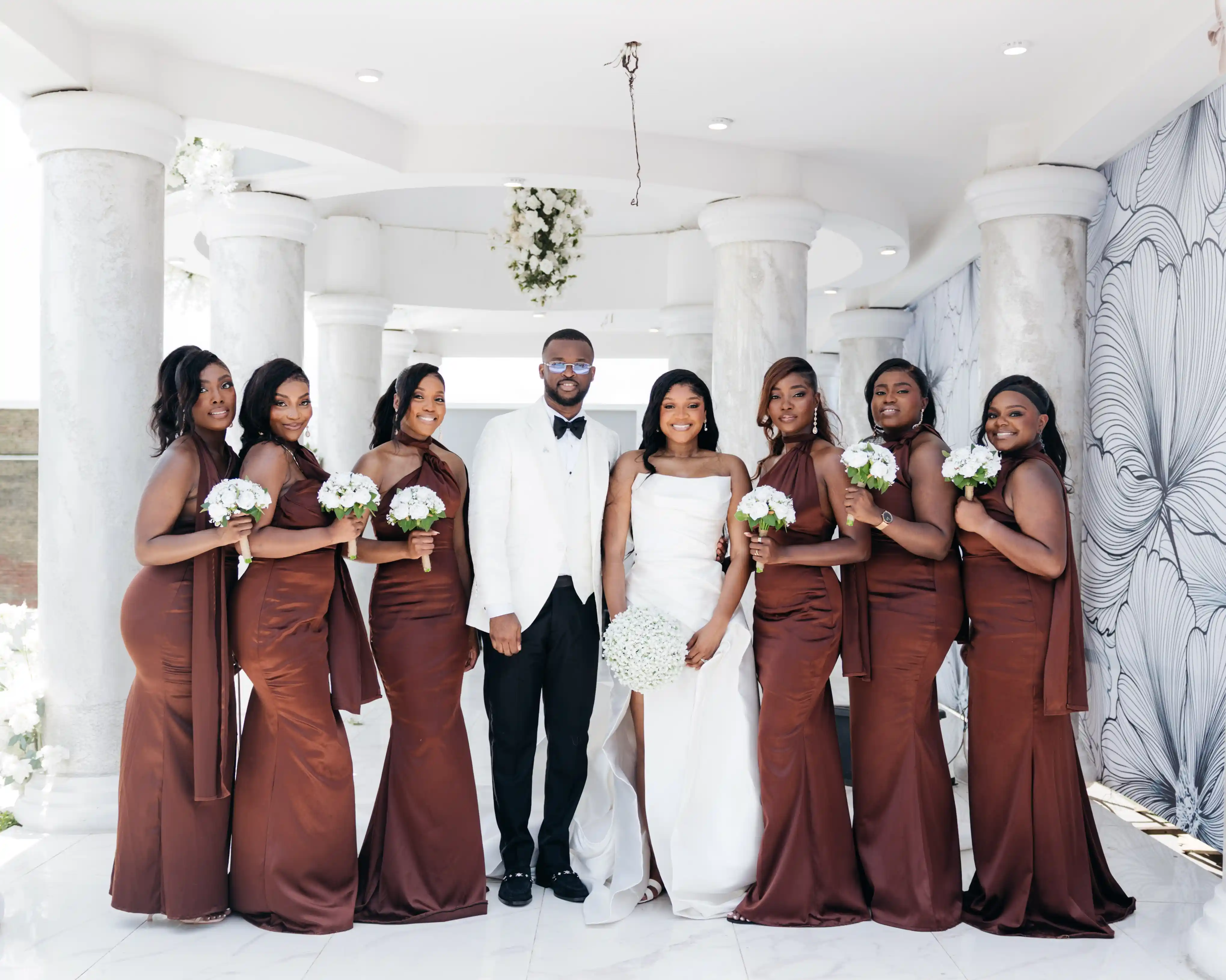 Bride and groom celebrating a luxury wedding coordinated by Victoria Brooks Events, a premium wedding planner in Nigeria.