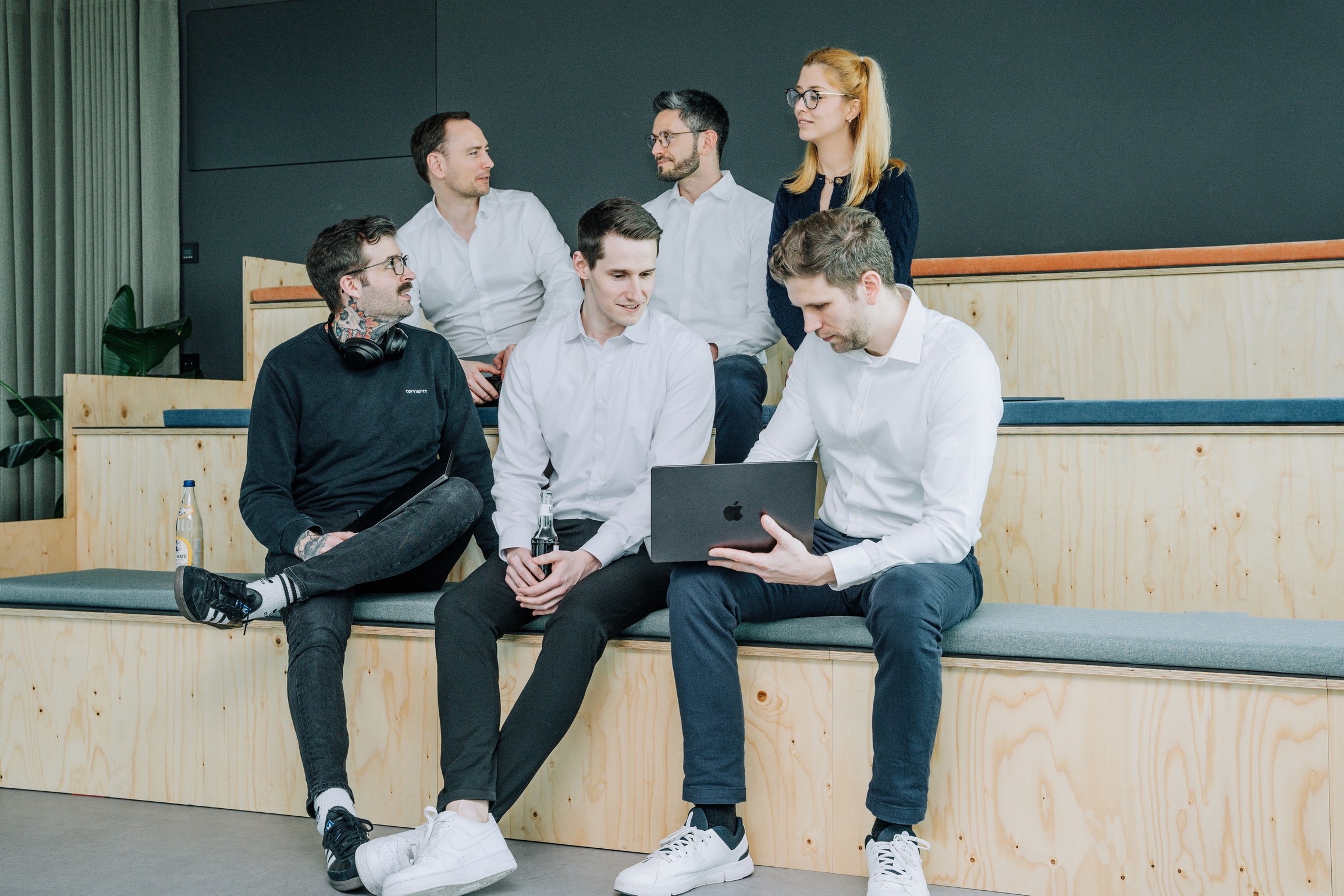 akeno team picture sitting in the office