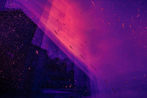 Background with purple and red triangular highlights.
