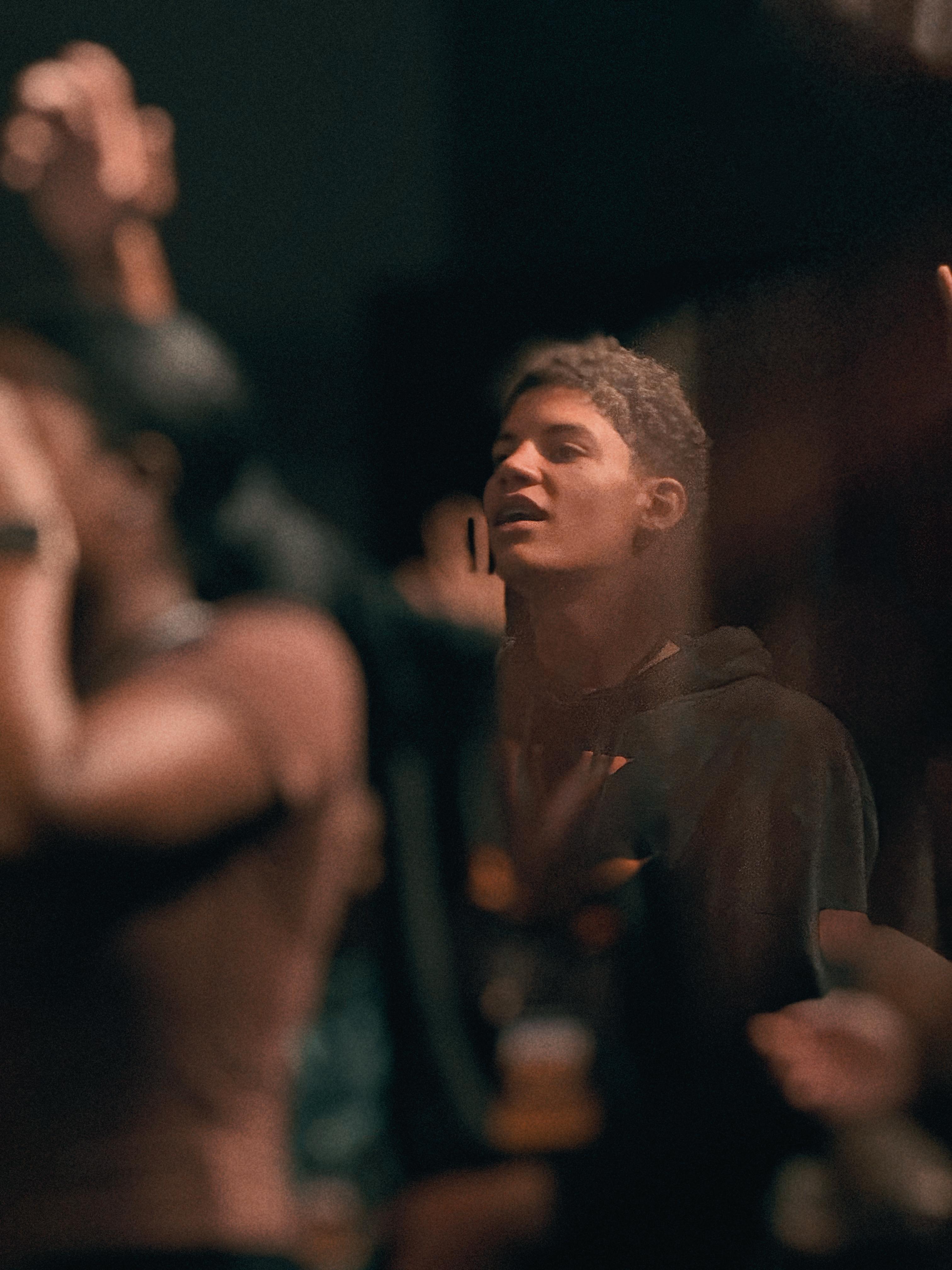 A sleek car parked against a vibrant backdrop, showcasing its design and style for an Instagram post.