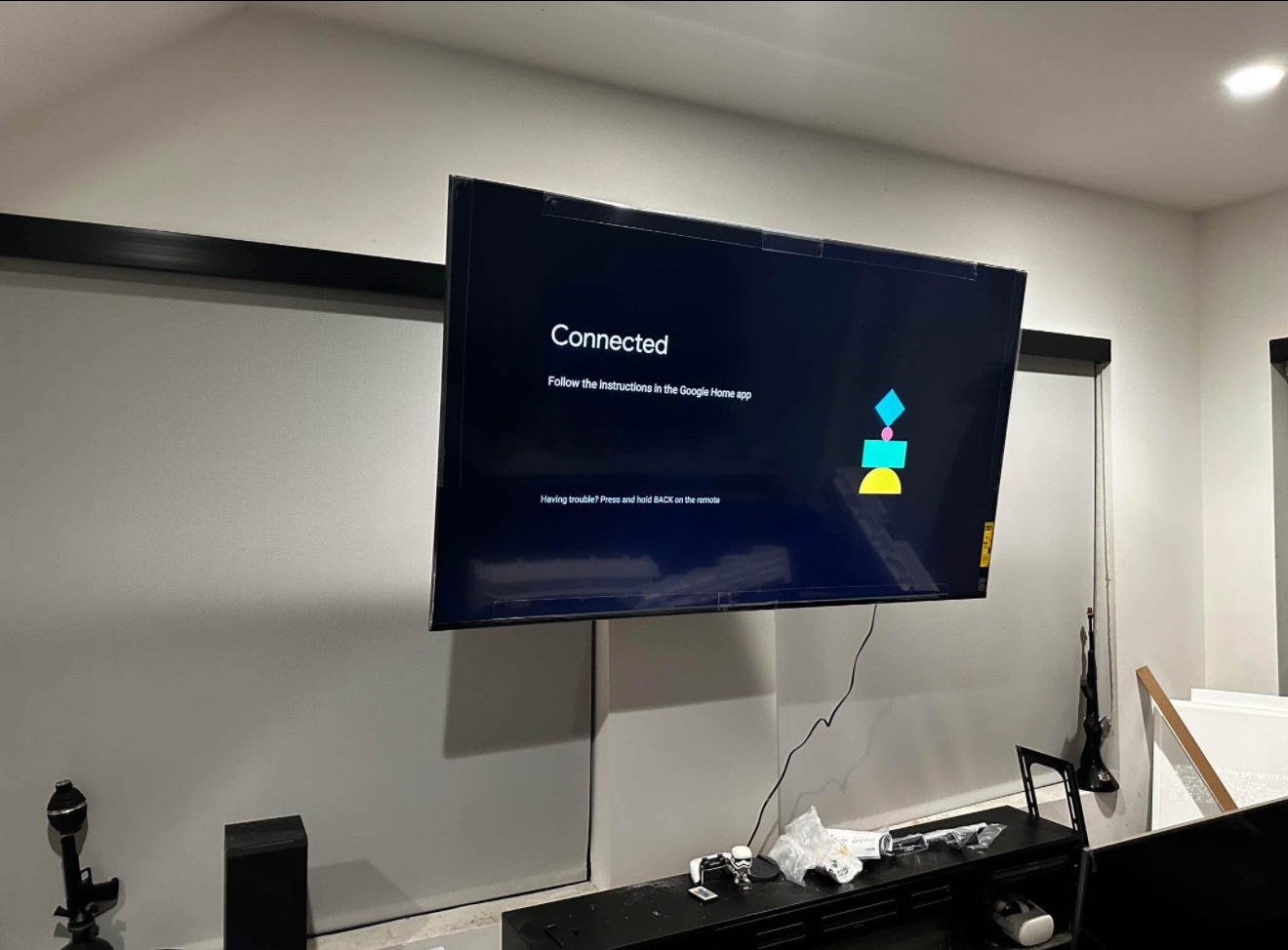 70-inch TV mounted using a swivel arm setup in a residential home in Miami, with clean wiring and a modern look.