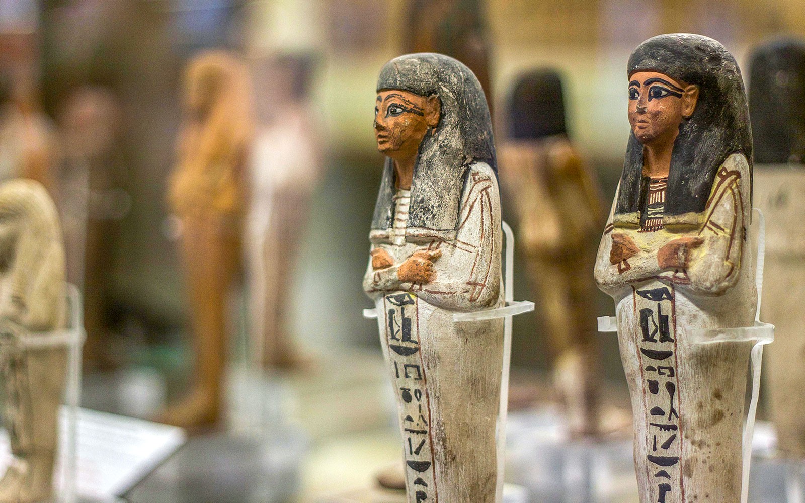 Ancient Egyptian figurines displayed at the National Museum of Egyptian Civilization in Cairo.