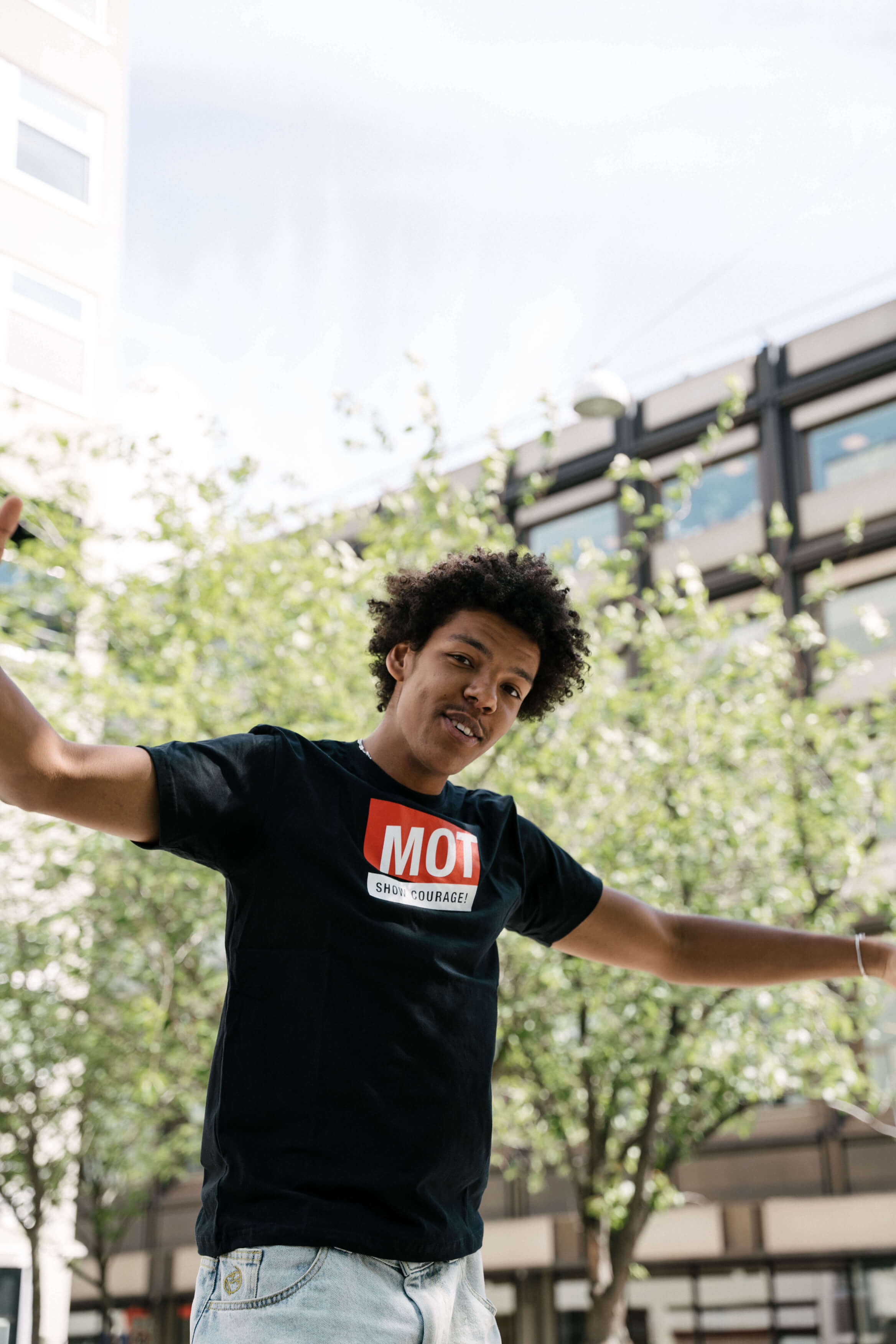 Neon boy with laptop