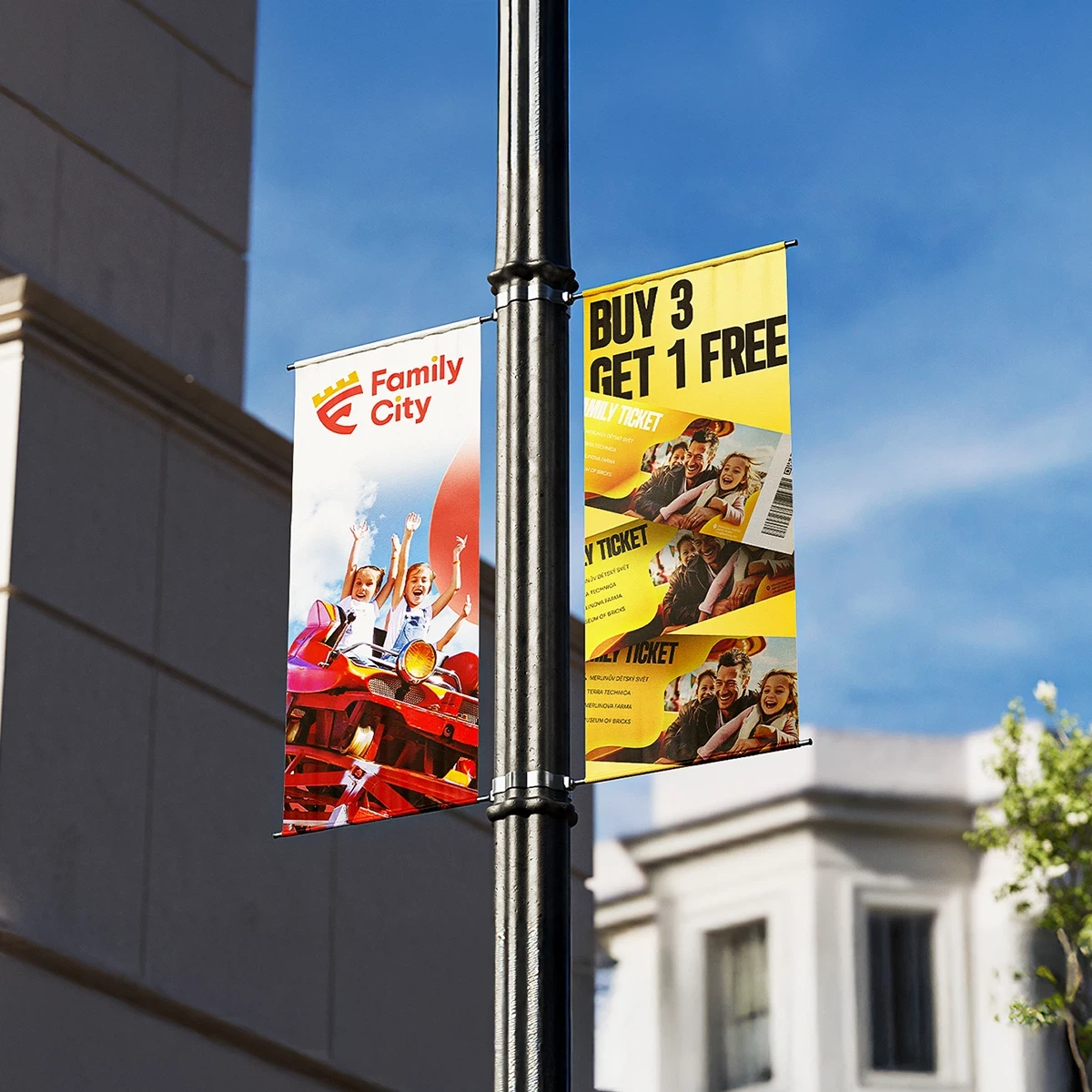 Family City amusement park promotional banners offering buy 3 get 1 free tickets on a pole.