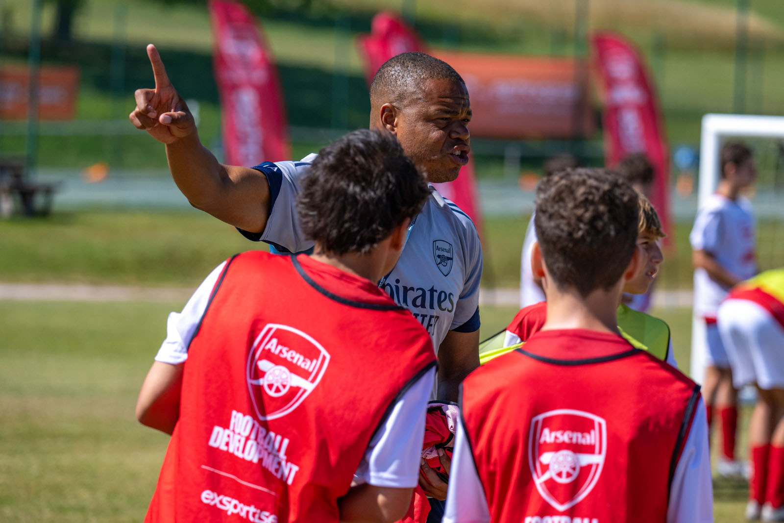 An Arsenal coach teachin students