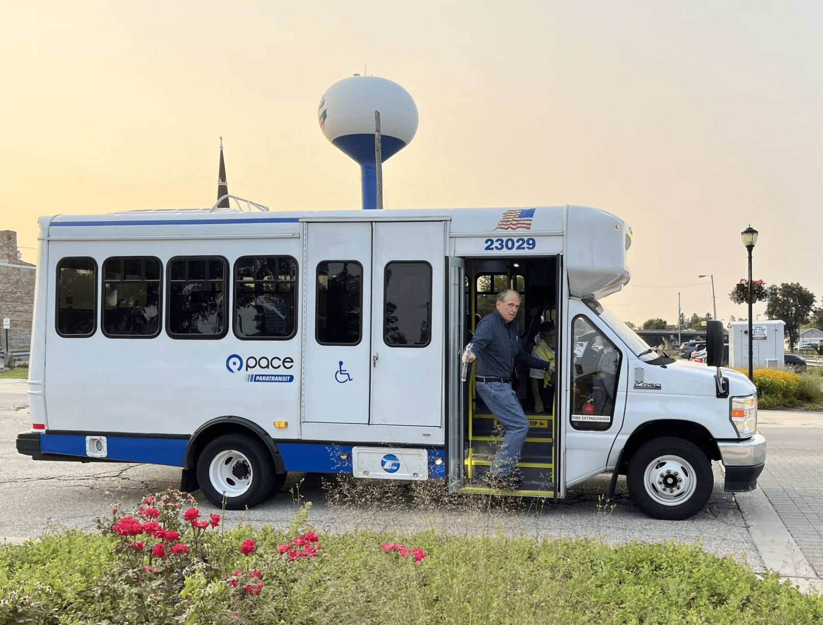 Scott Summers catching a ride on the PACE paratransit bus