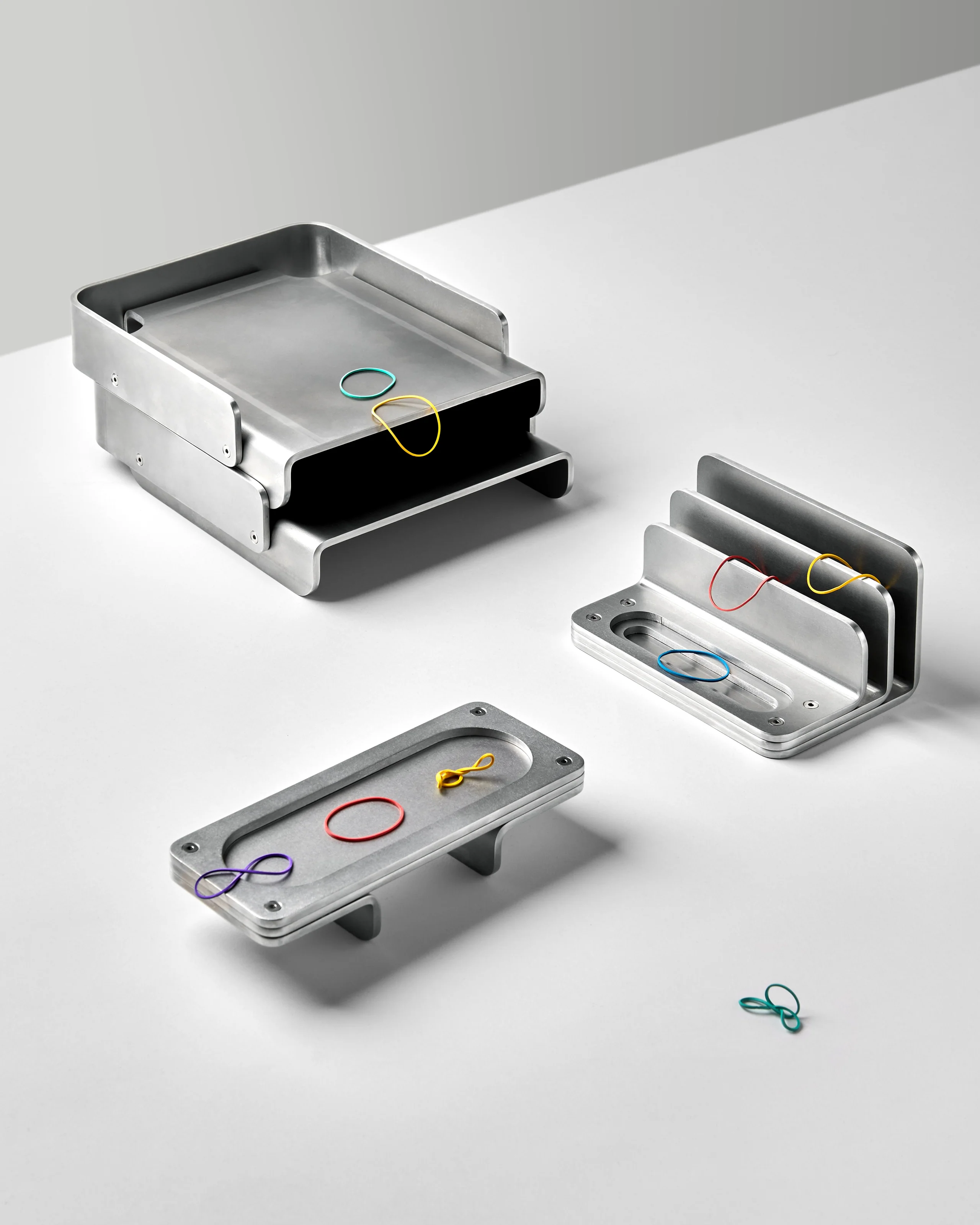 Craighill Industry Desk Set in brake-formed clear anodized aluminum, with in/out box, letter holder, and catchall