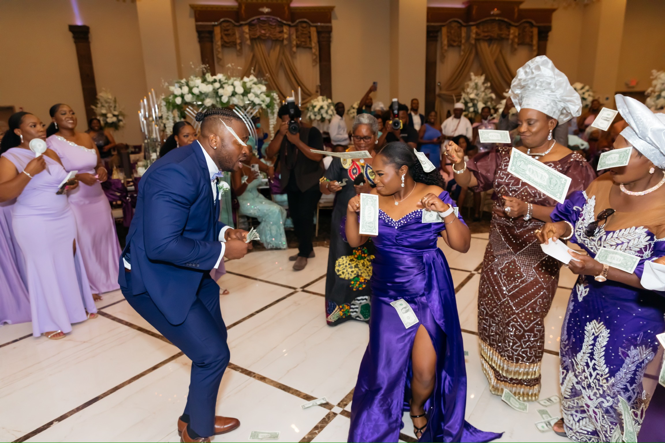 gold wedding band on white textile