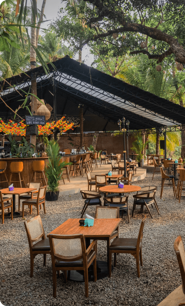 ECO Goa features open seating designed with natural materials and abundant sunlight, creating a welcoming and relaxed atmosphere.