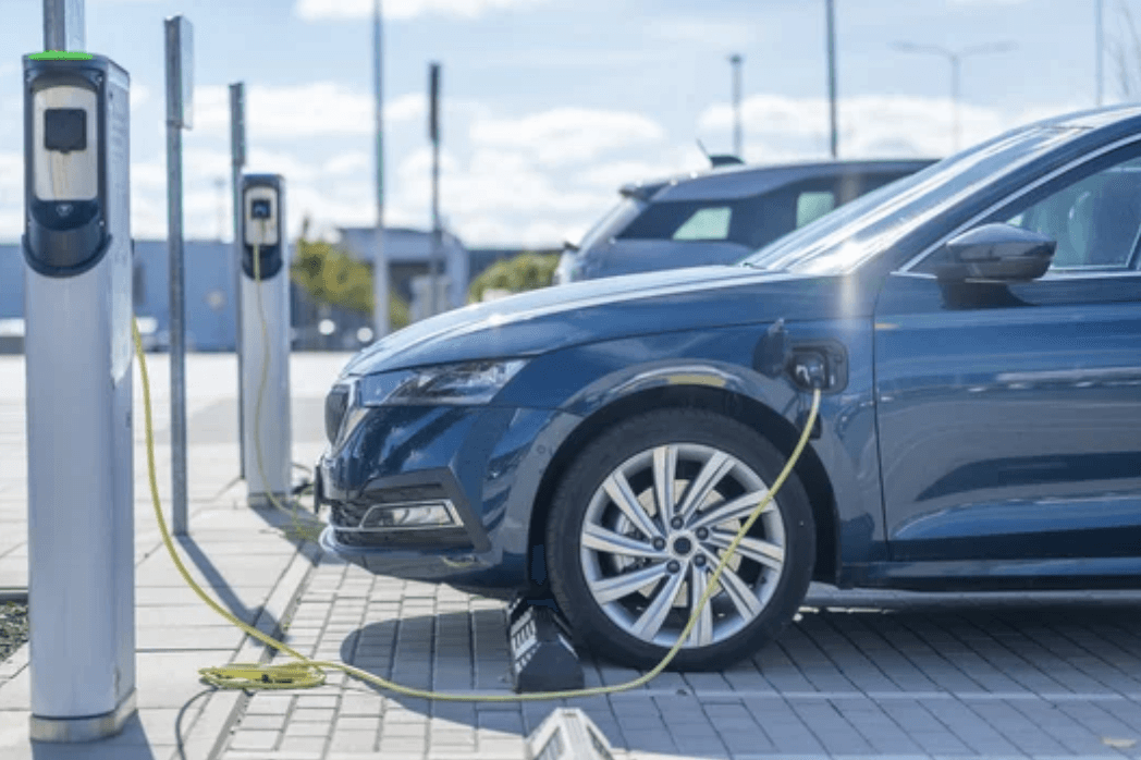 Image of electric vehicle charging at a station