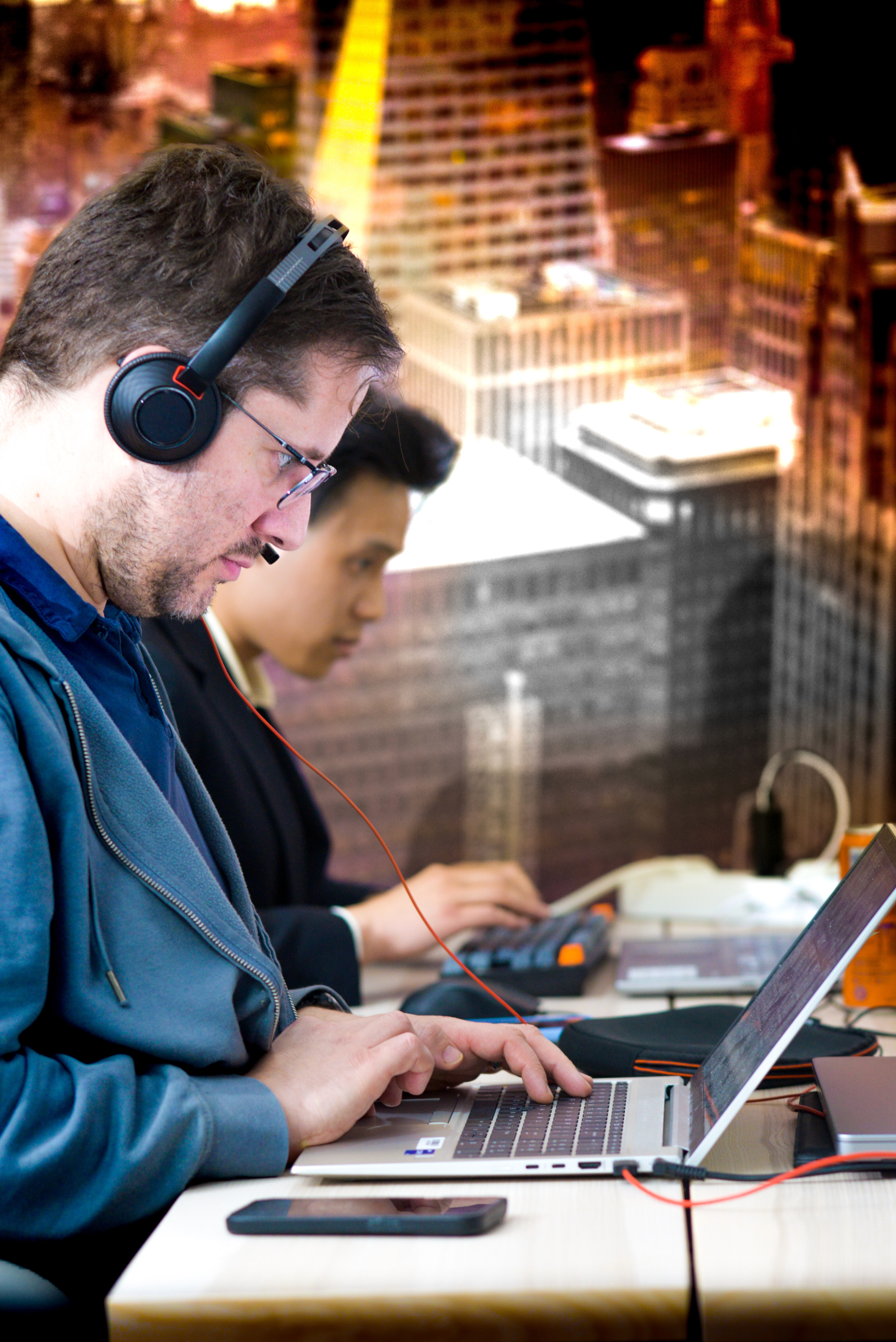 Man behind computer screen
