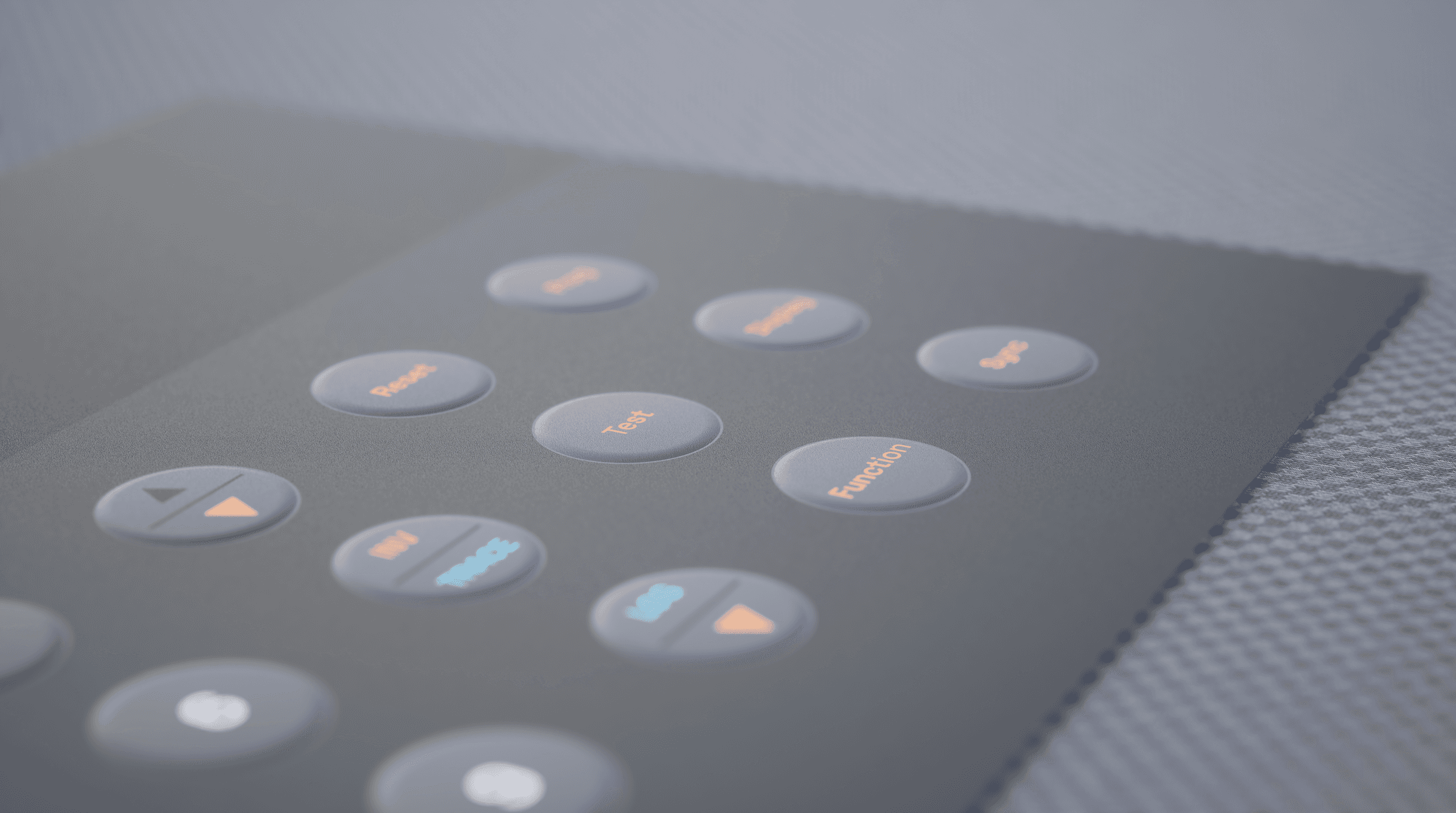 Close-up of an embossed membrane panel with raised buttons for tactile feedback