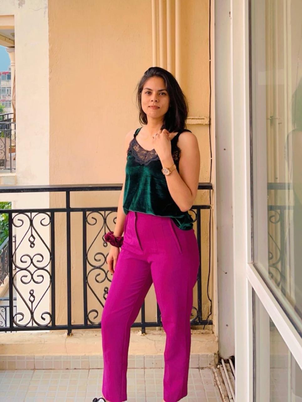 A muscular man lifting a dumbbell and looking upward with a focused expression. Quote below reads: “I’ve never felt this strong and confident in my life…” – Samantha Lee, Marketing Director.