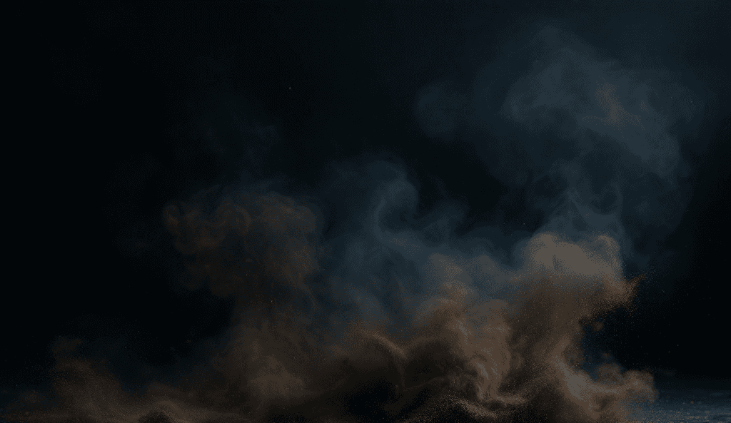 A cloud of brown dust rising against a dark background