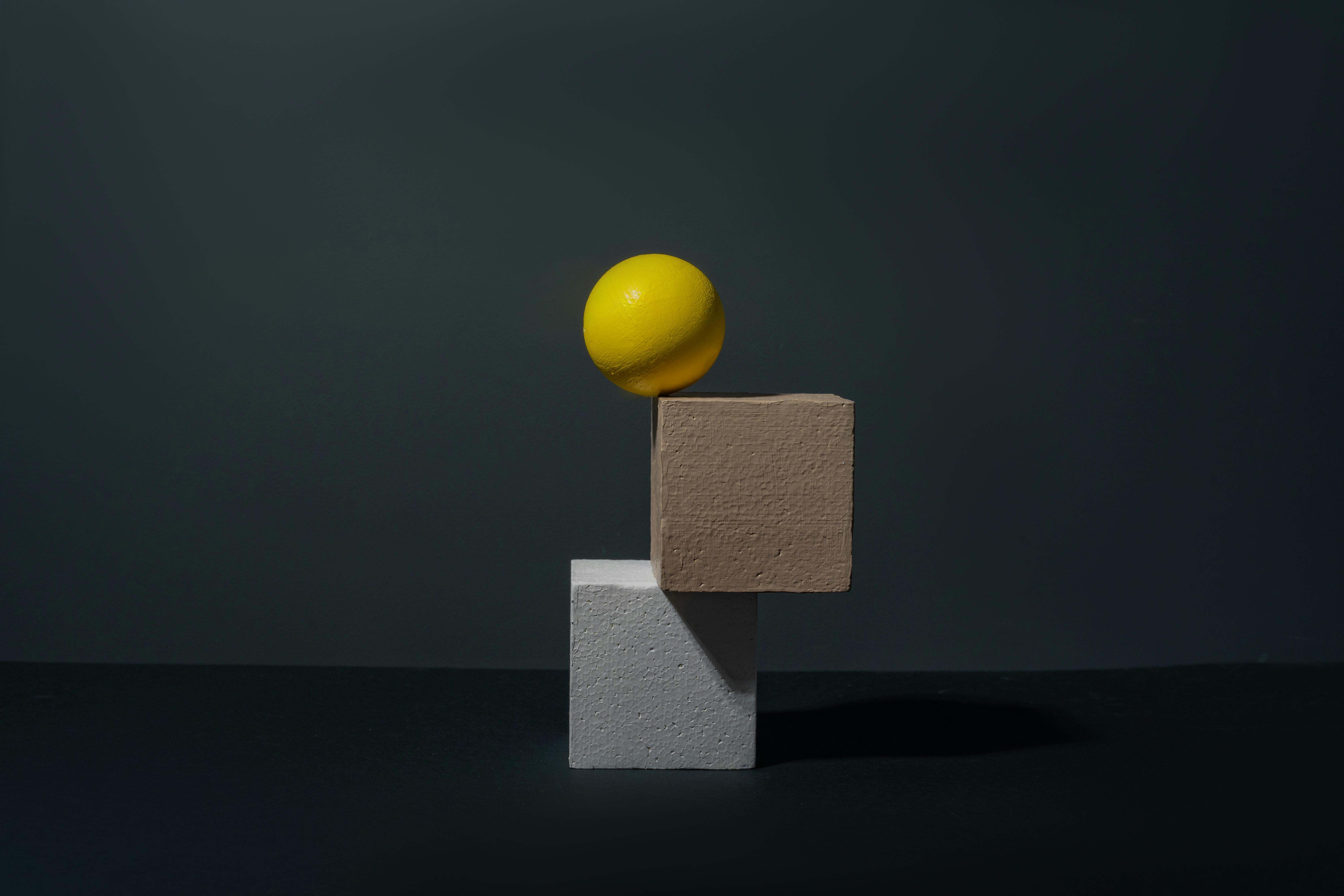 3 male posing in outdoor photoshoot, wearing red dress.