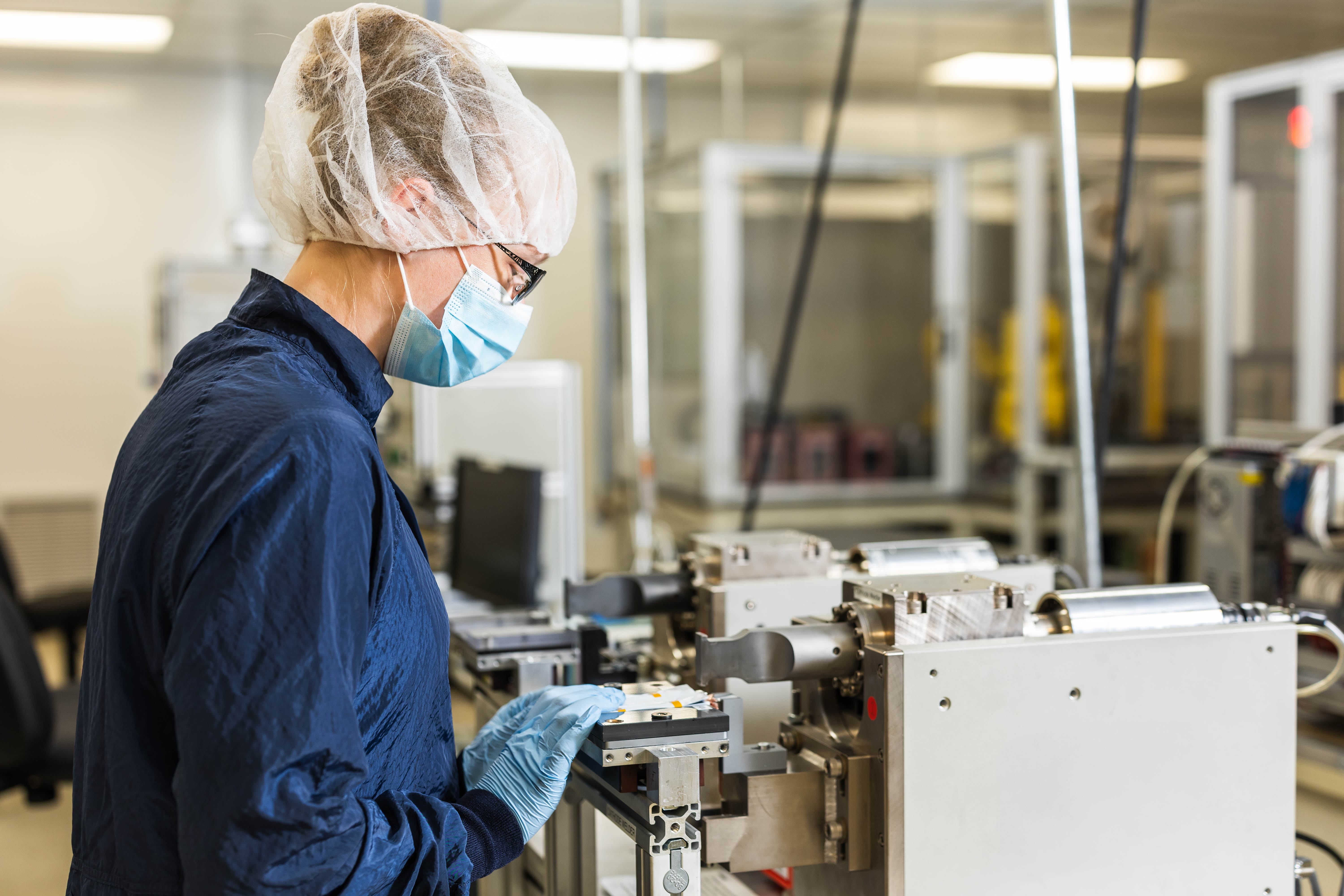 Photo of EnPower Engineer working with precision technical tools