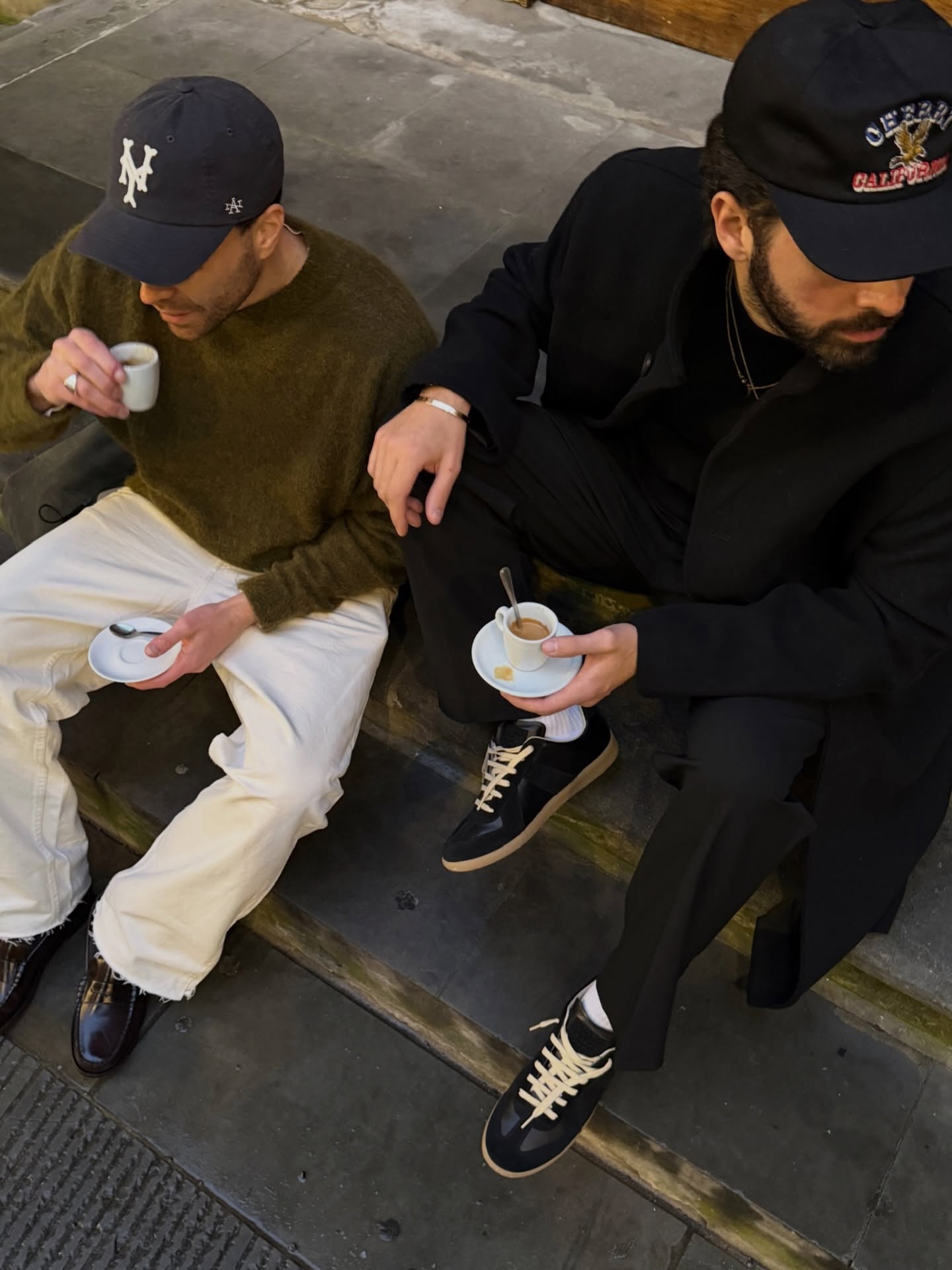 Streetside billboard with flyposters of the Batch.Works brand and illustrations