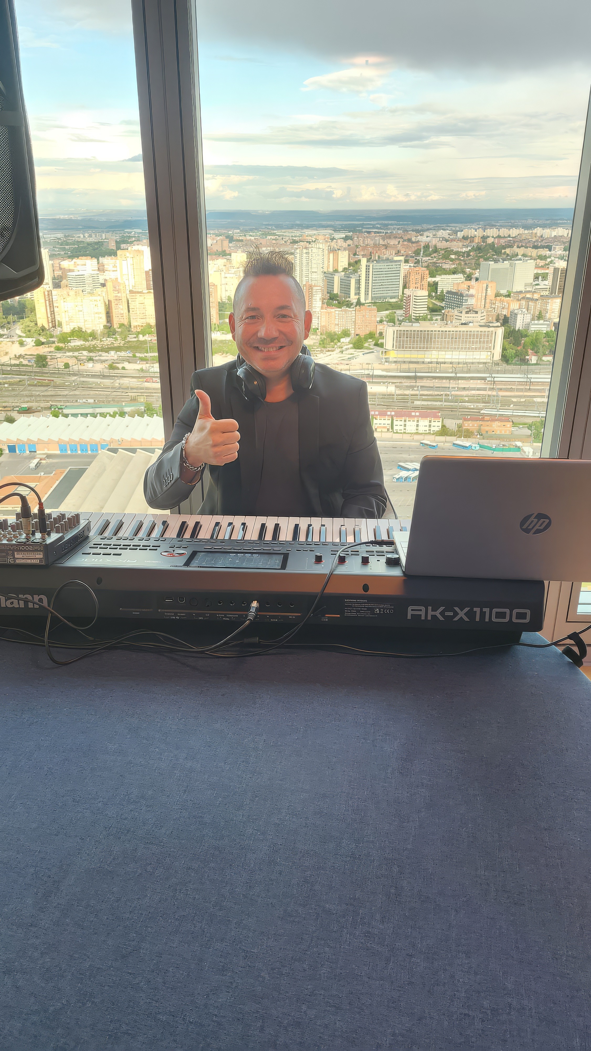 A man standing in front of a projector screen