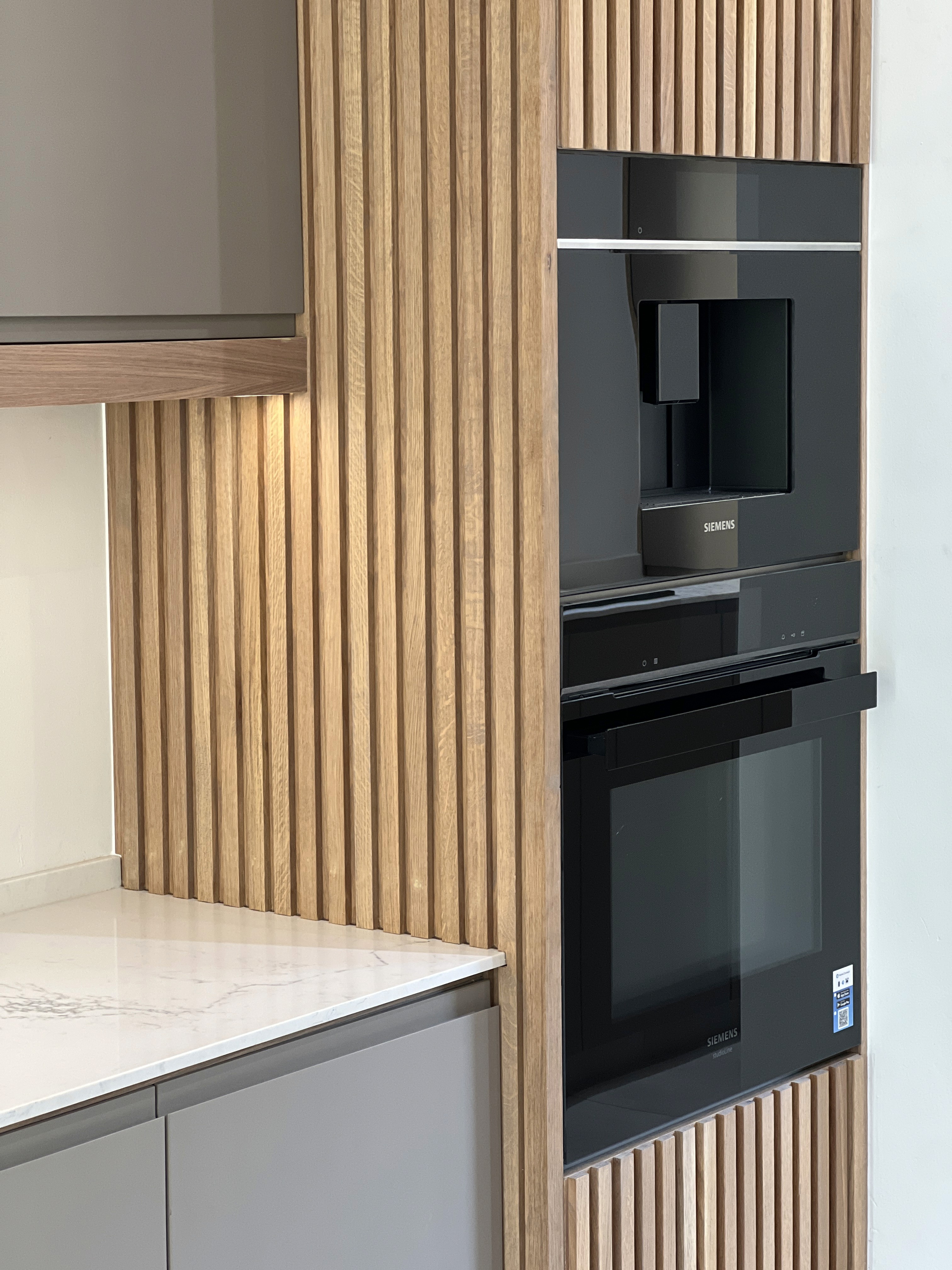 Contemporary wooden architecture featuring natural cedar cladding and floor-to-ceiling glazing