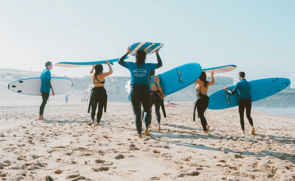 A kid practicing surfing