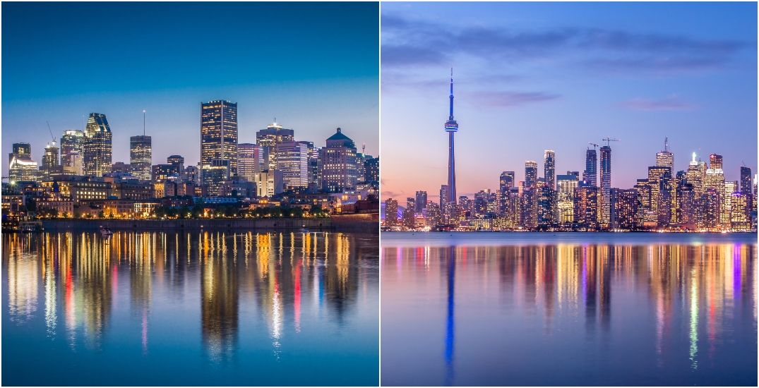 Fireworks illuminate the night sky above a city.