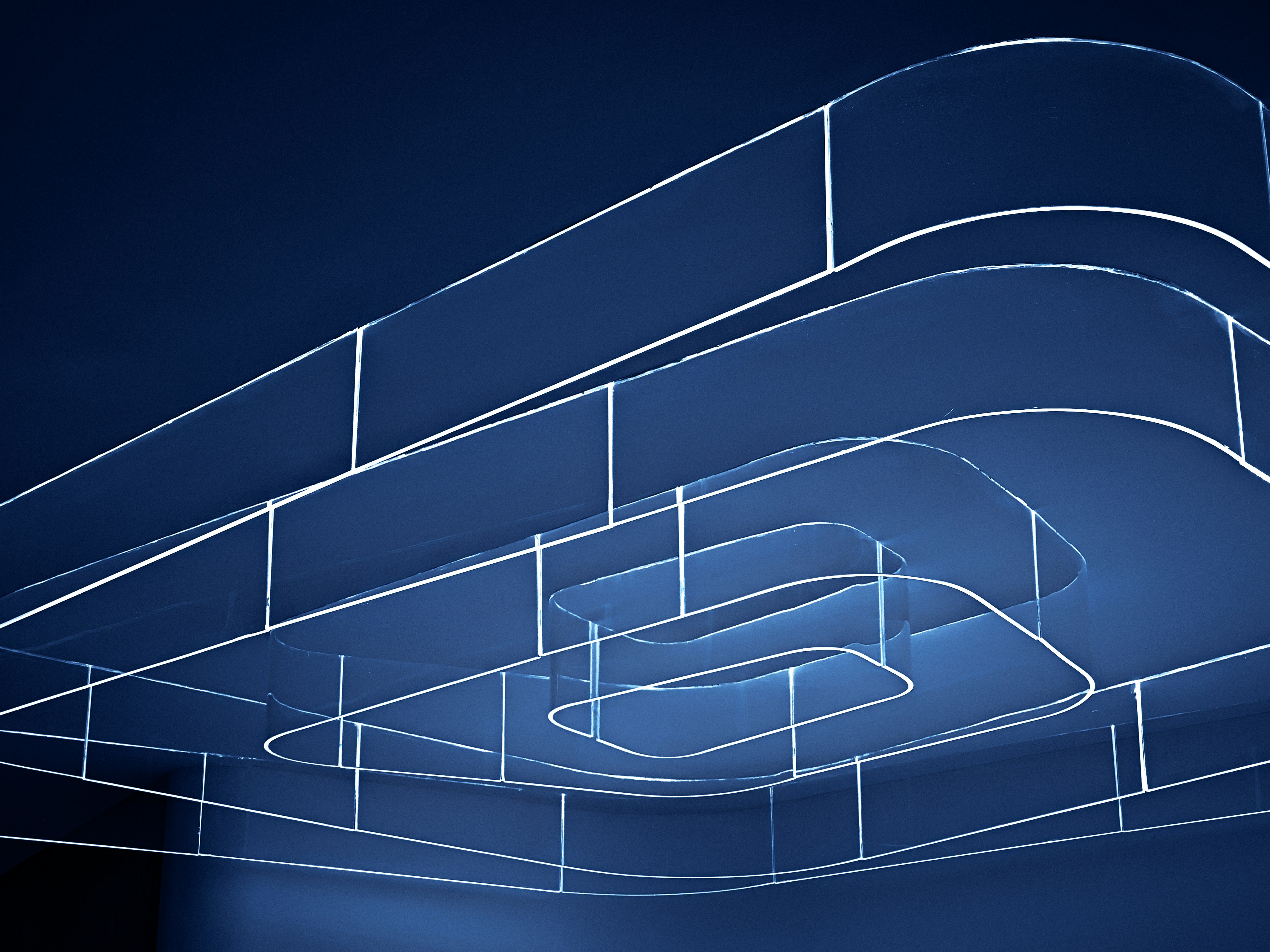 a blue abstract background with lines and shapes