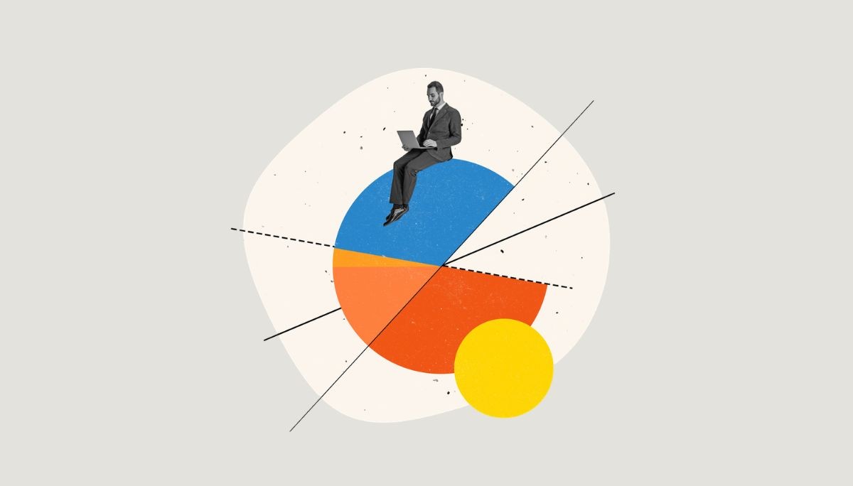 Professional with laptop sitting on abstract geometric circle, symbolizing what CIO stands for and what a CIO does.