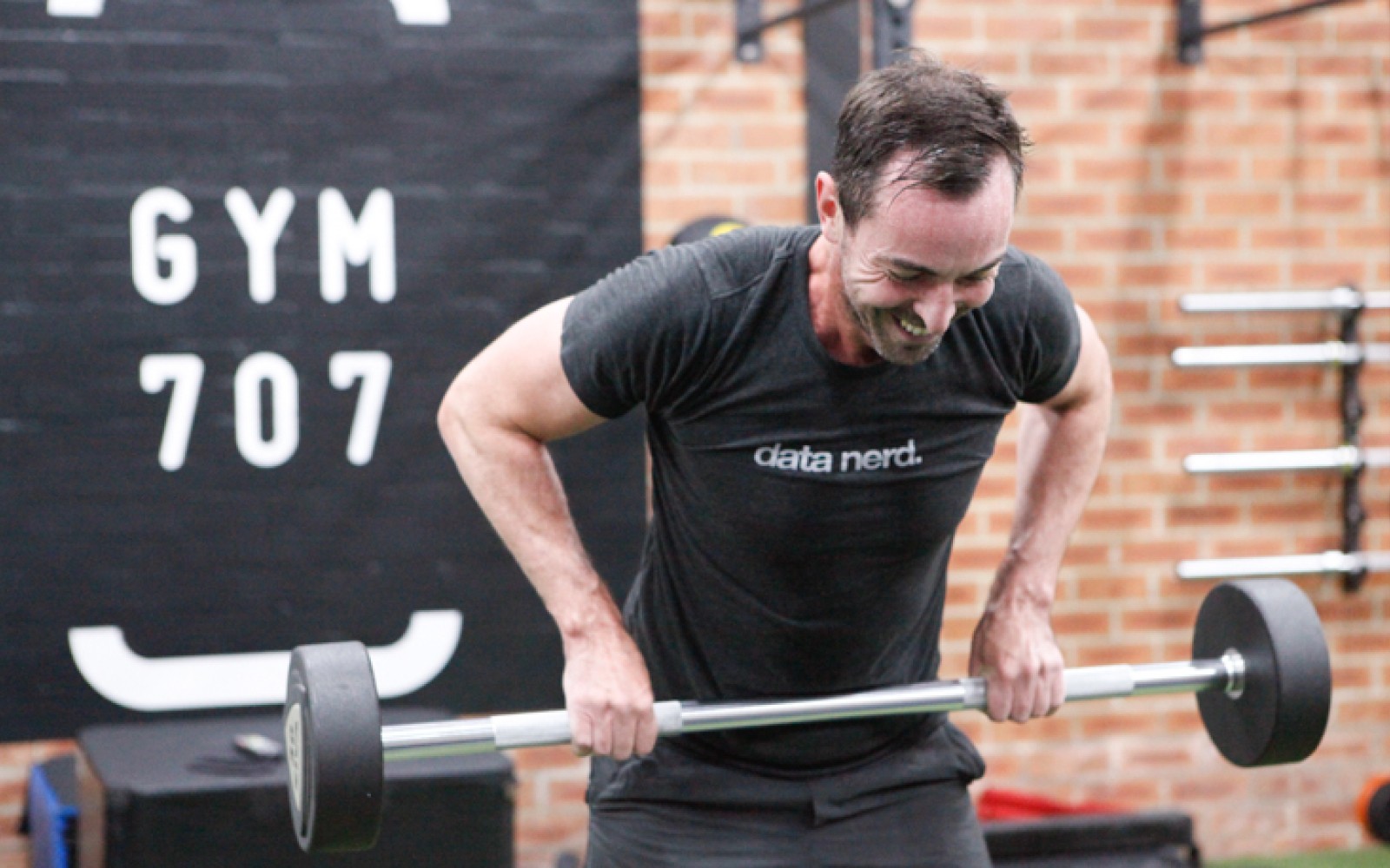 Path winding through a field of pink flowers