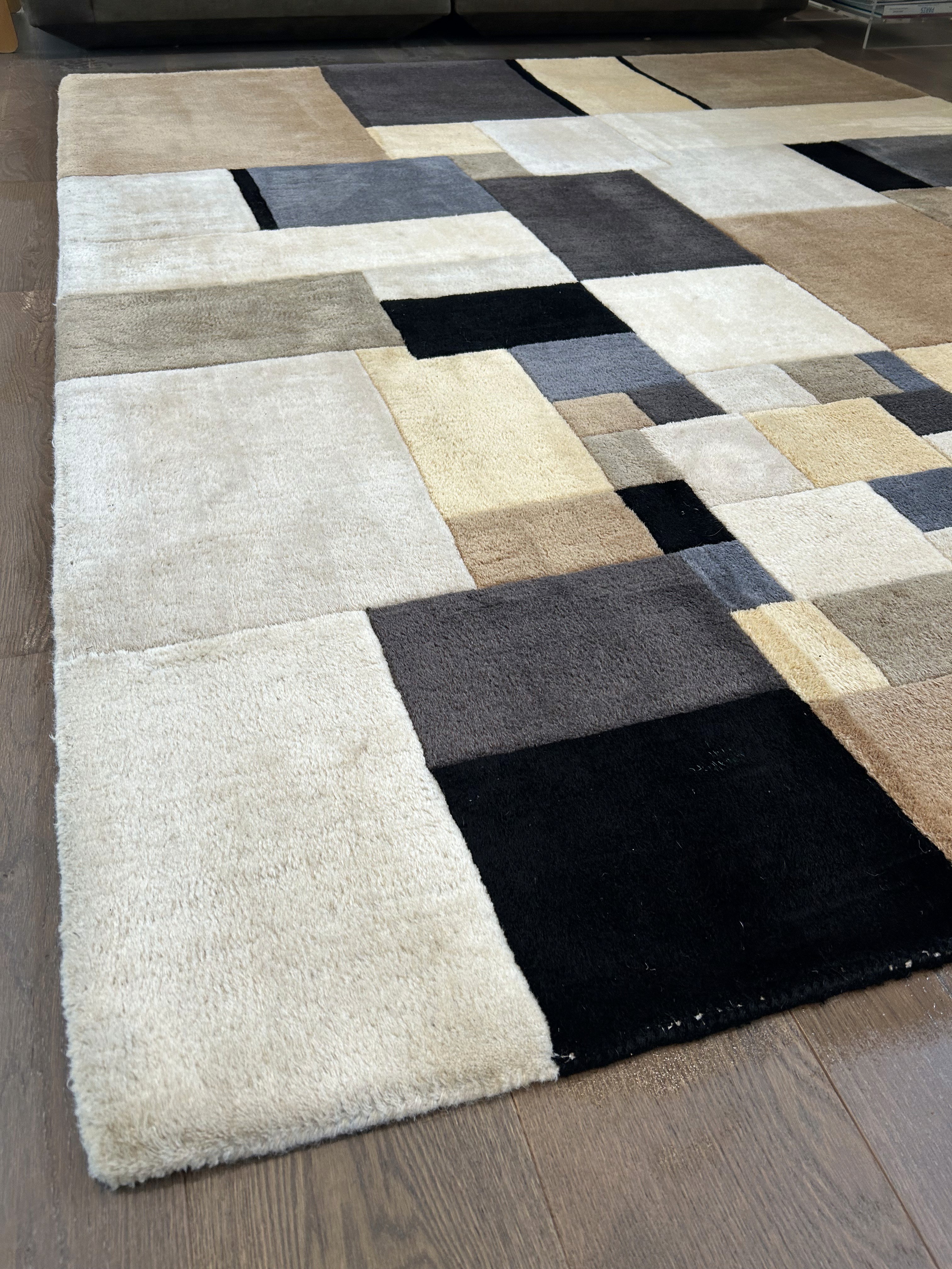 Entretien textile haut de gamme de tapis Ligne Roset à Rennes avec Propre et Net