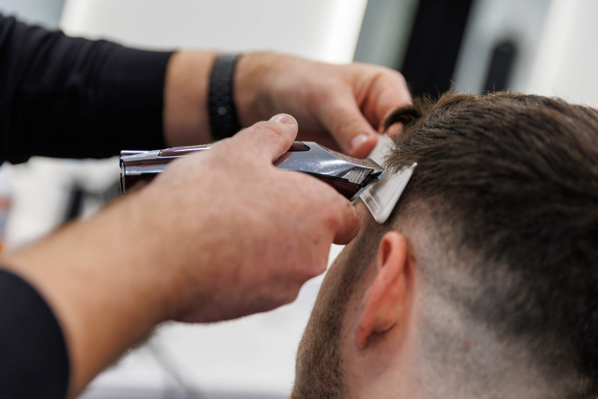 Close up of haircut using clippers