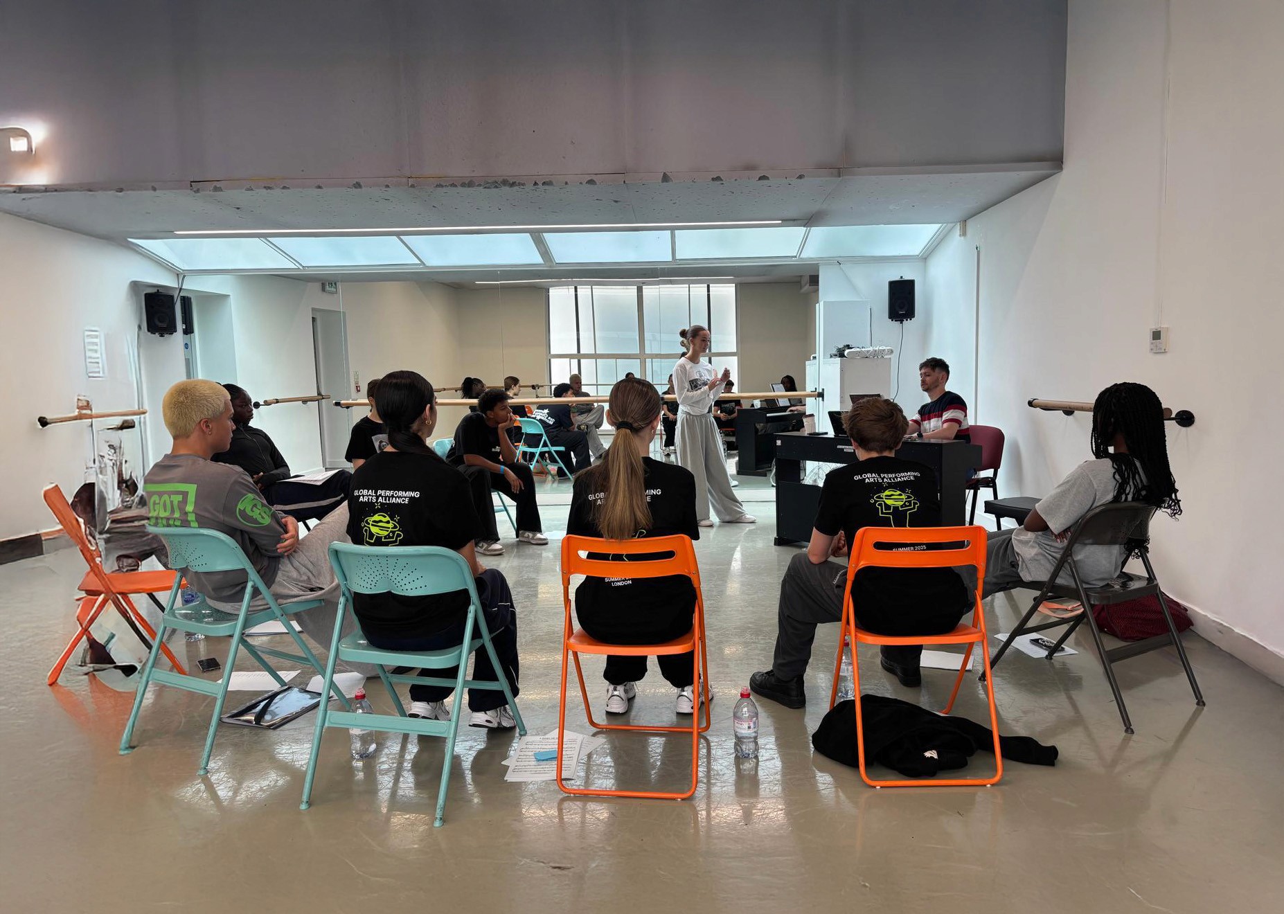Students taking part in a performing arts workshop