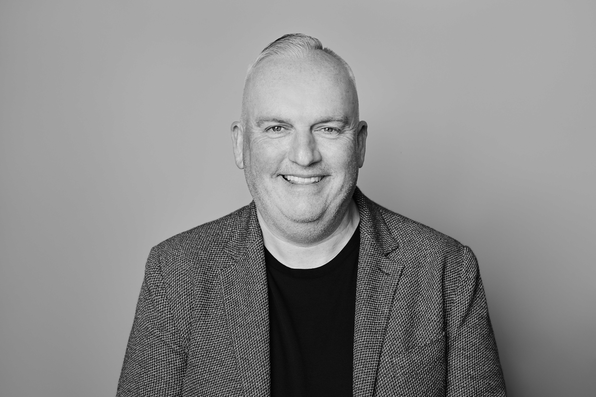 A black and white image of Chris Cansfield