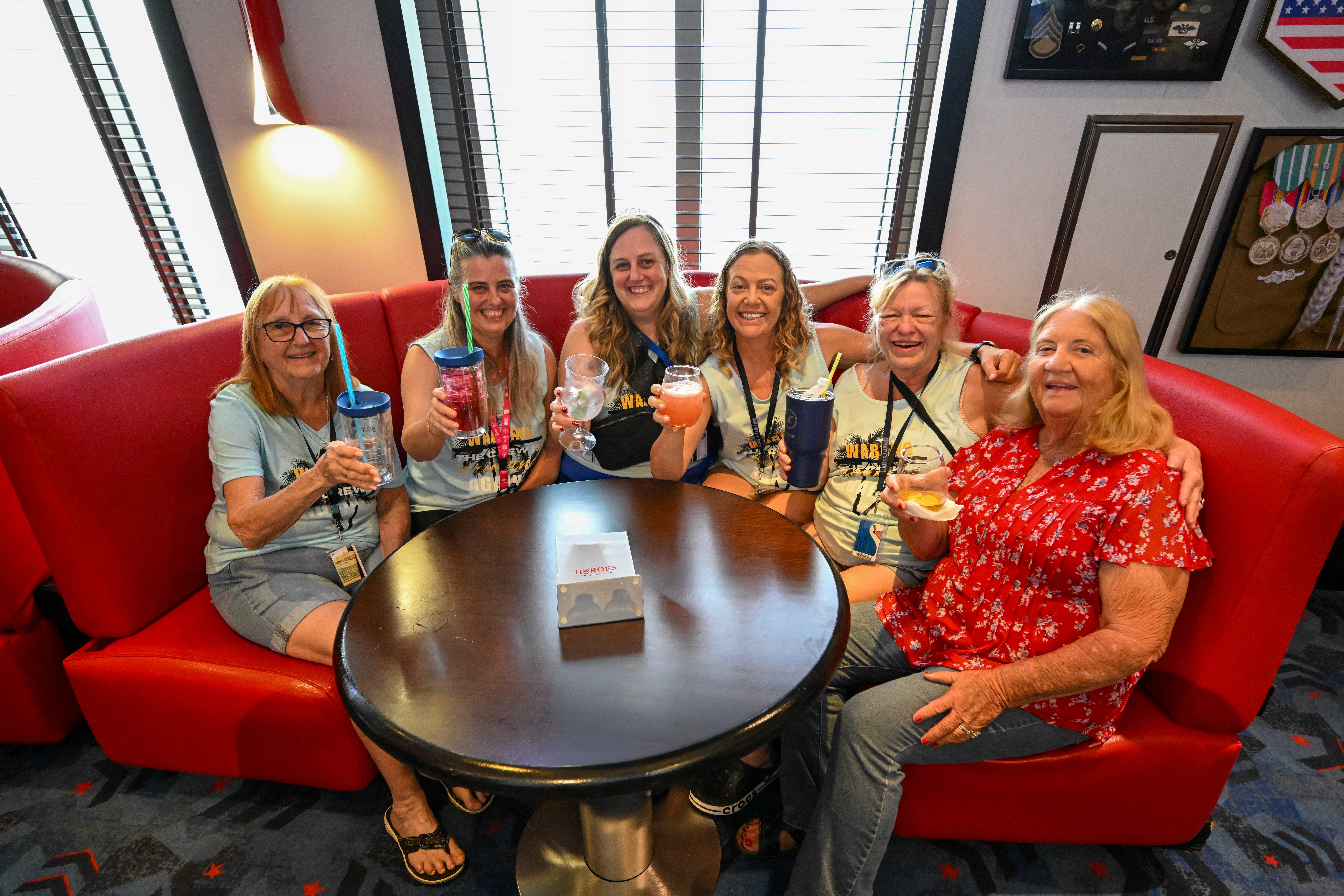 A group of women raising a toast