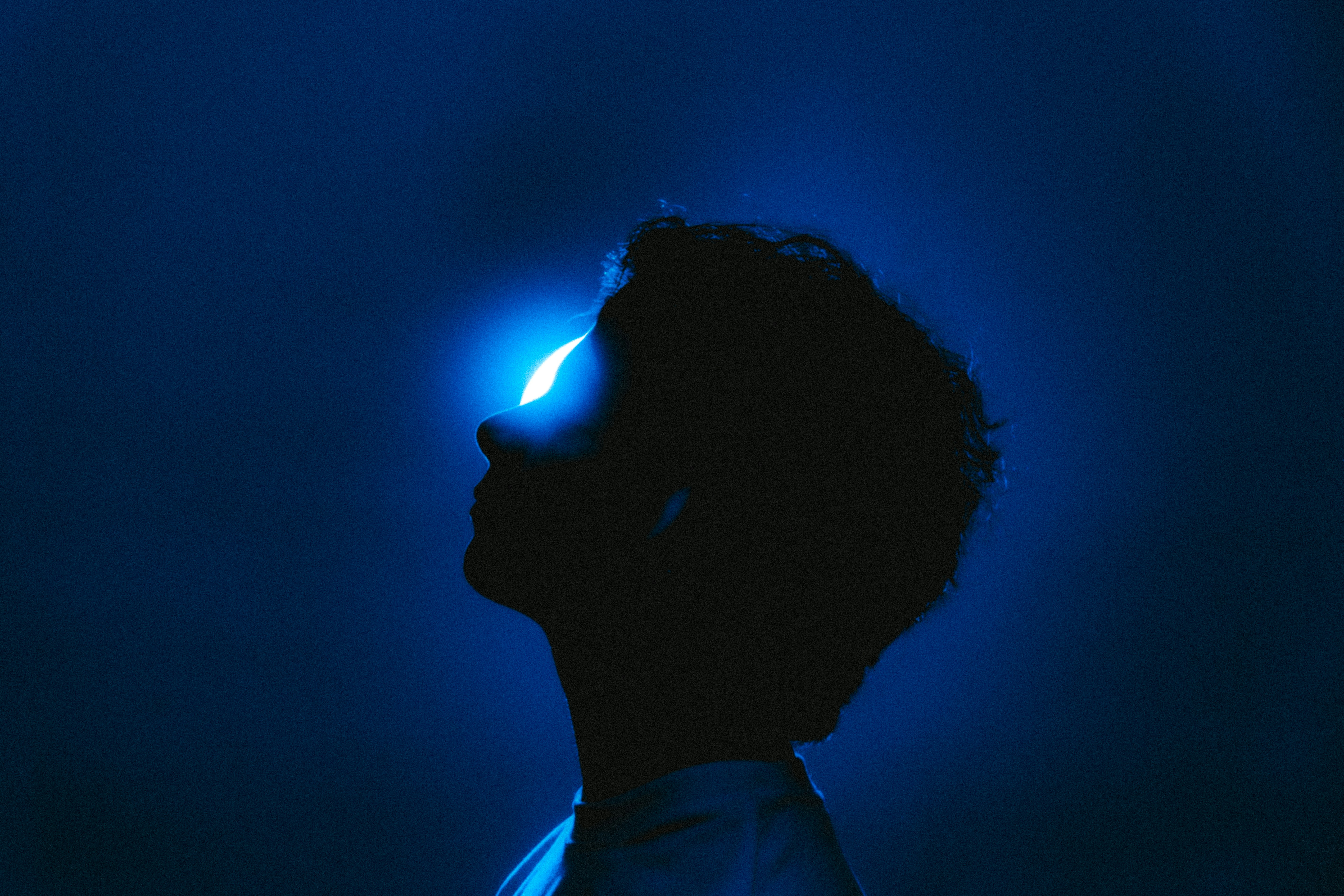 a black and white living room with a large tv
