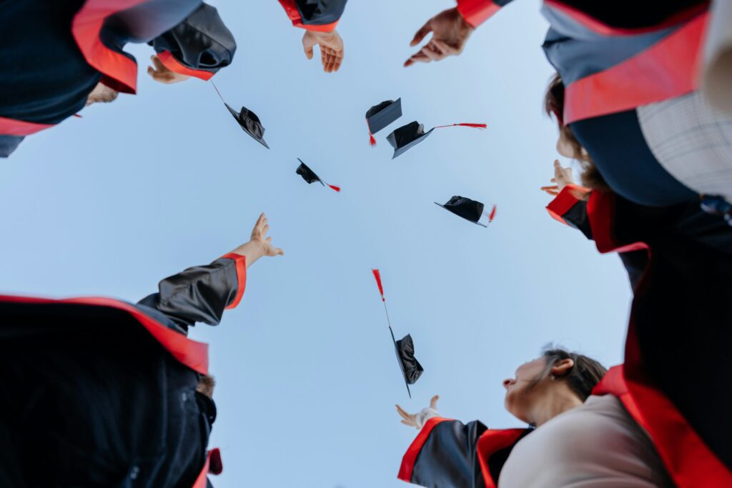 College Graduates Throwing Caps