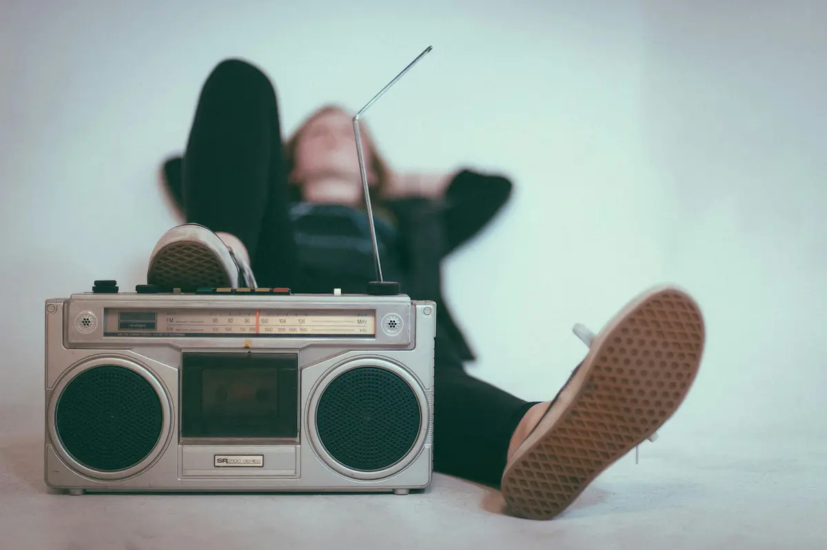 Retro boombox and Vans shoes representing 1980s youth culture and music