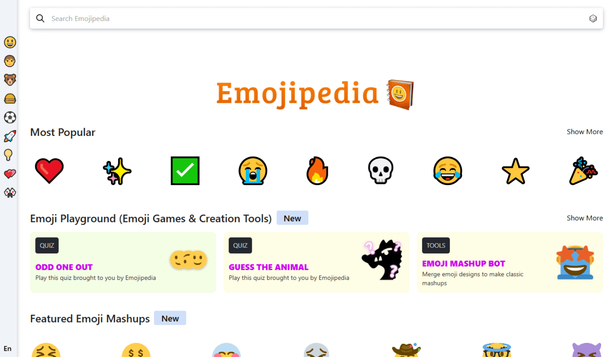 "Screenshot of the Emojipedia homepage featuring popular emojis, emoji games, and tools such as 'Guess the Animal' and 'Emoji Mashup Bot.'"