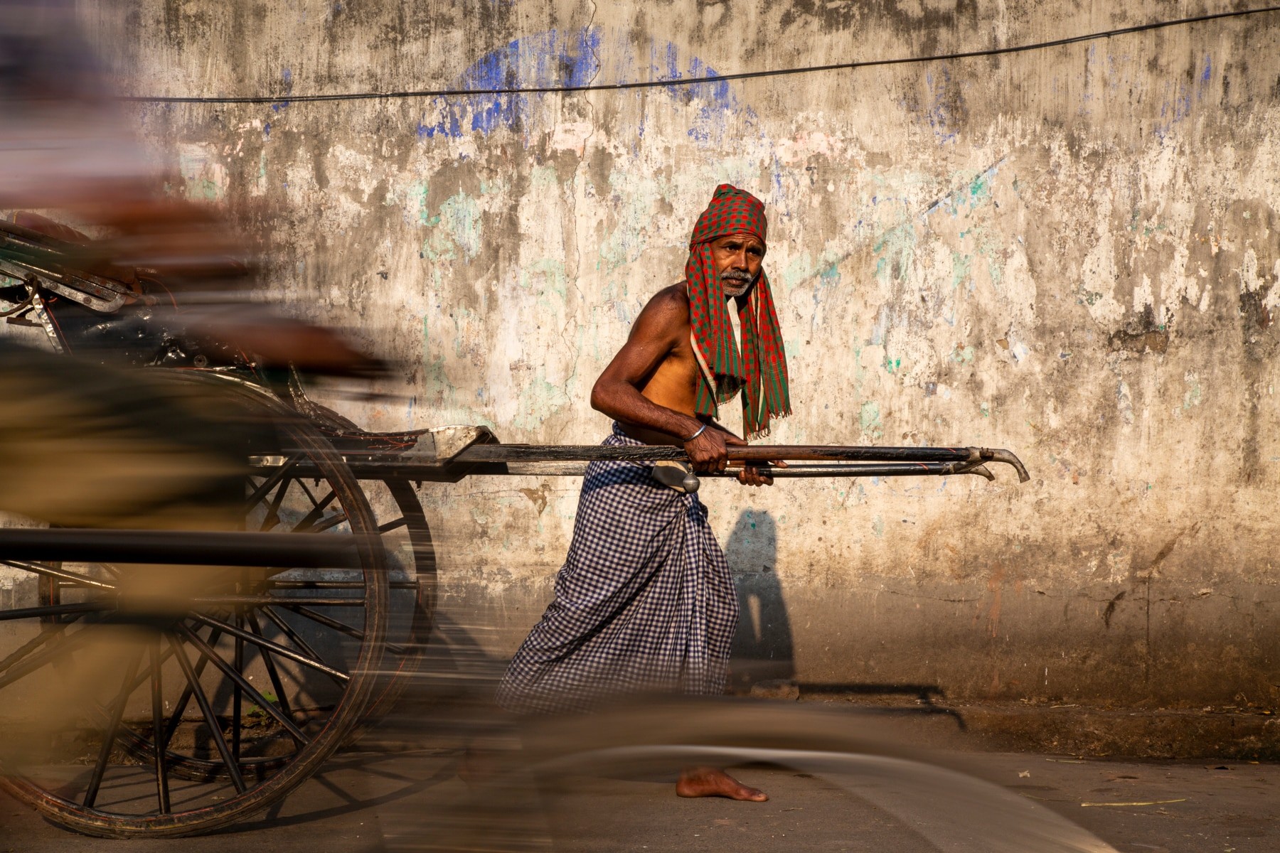 Against Traffic: Honoring the Strength and Spirit of India’s Rickshaw Pullers