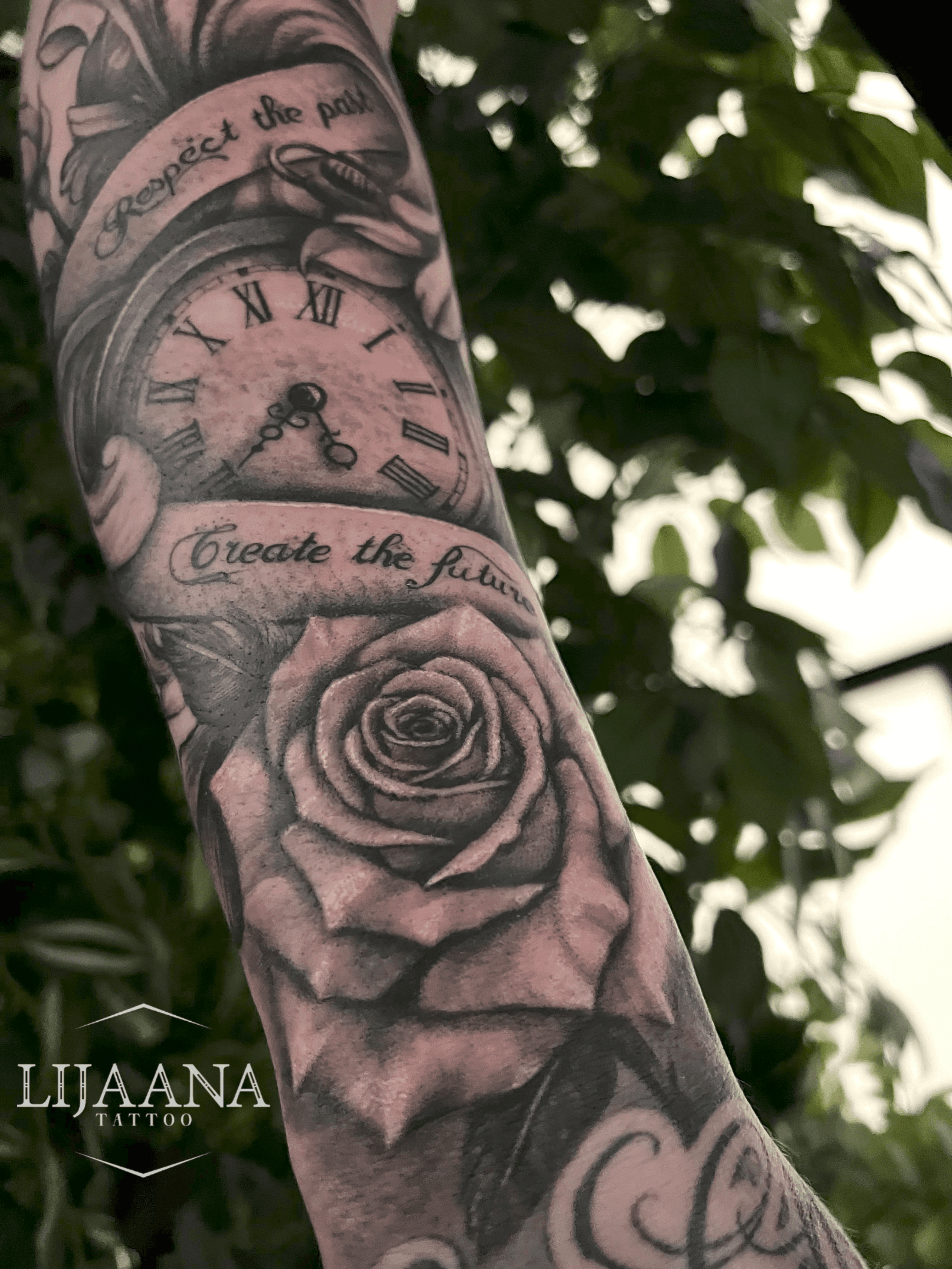 Realism clock and rose tattoo sleeve by Lijaana Tattoo in Helsinki