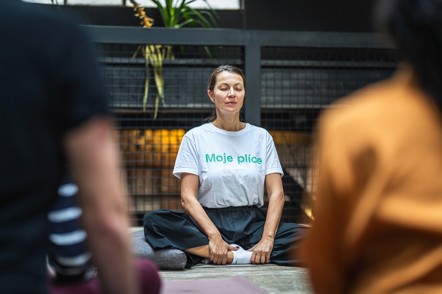 Guided mindfulness or wellness session taking place during a conference programme.