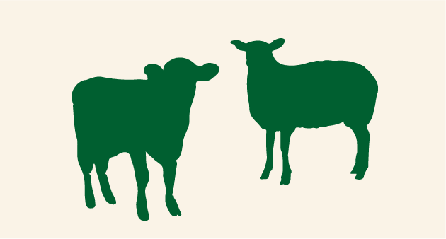 Two decorative sheep and cow from elisaari island.