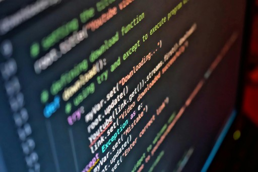 Close-up of security code on monitor screen, nDataStor cybersecurity services