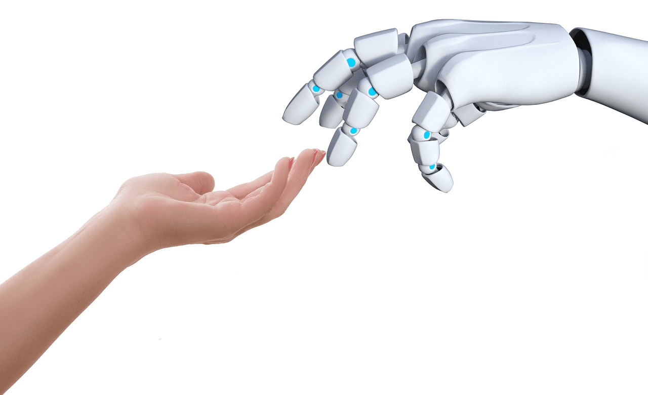 Robot and human hands touching each other 