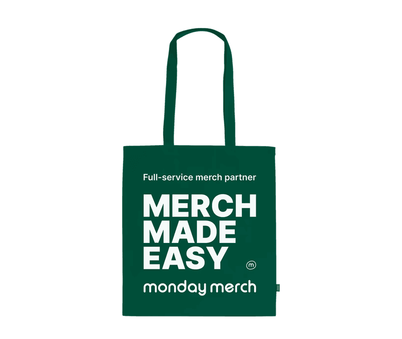 green tote bag with "Merch Made Easy" with monday merch brand