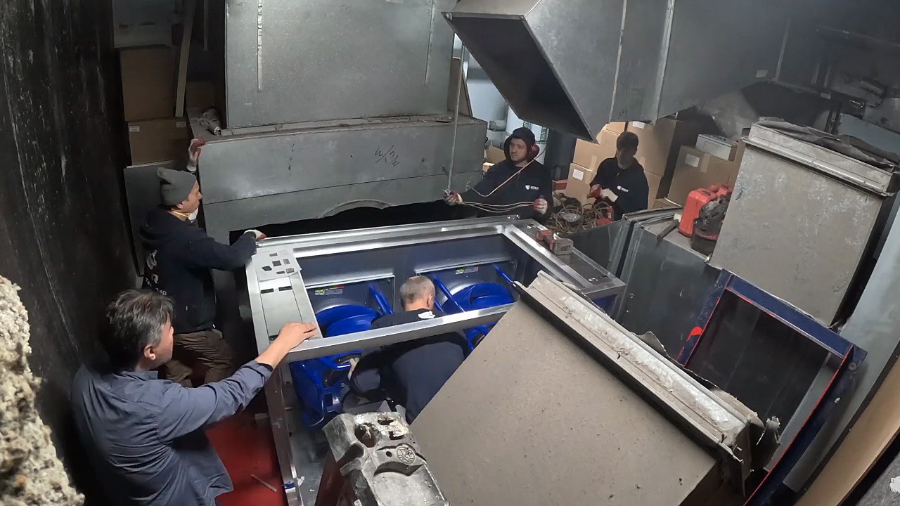 GRR crew installing new return fan package during live BronxCare hospital retrofit in NYC