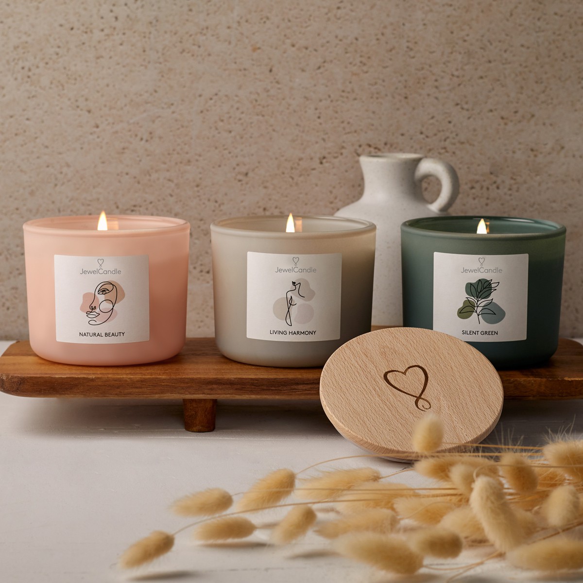 An edition of 3 candles for a natural themed candles, showcasing illustrations in a one-line minimal artstyle