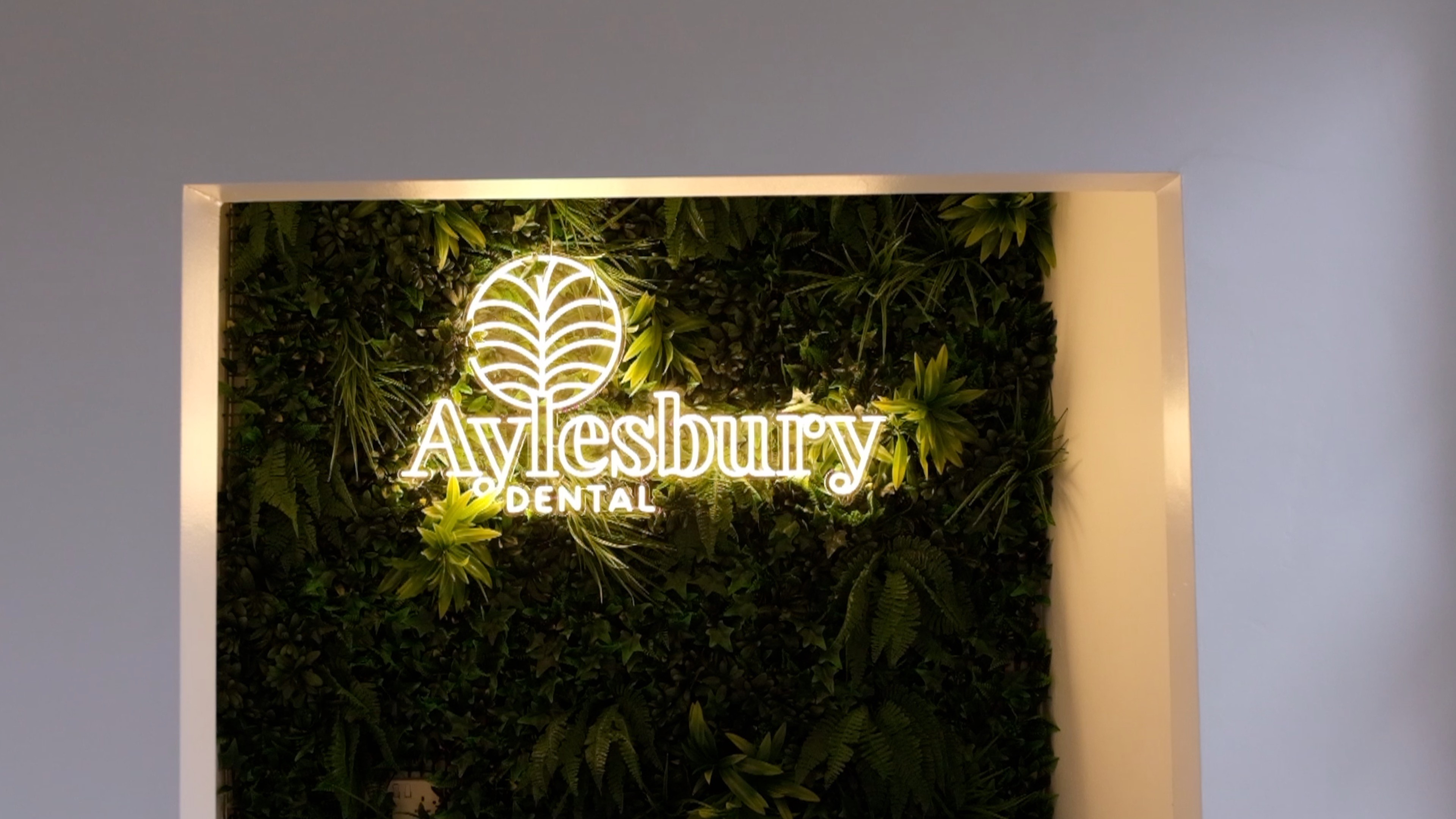 a building with wavy lines on it against a blue sky