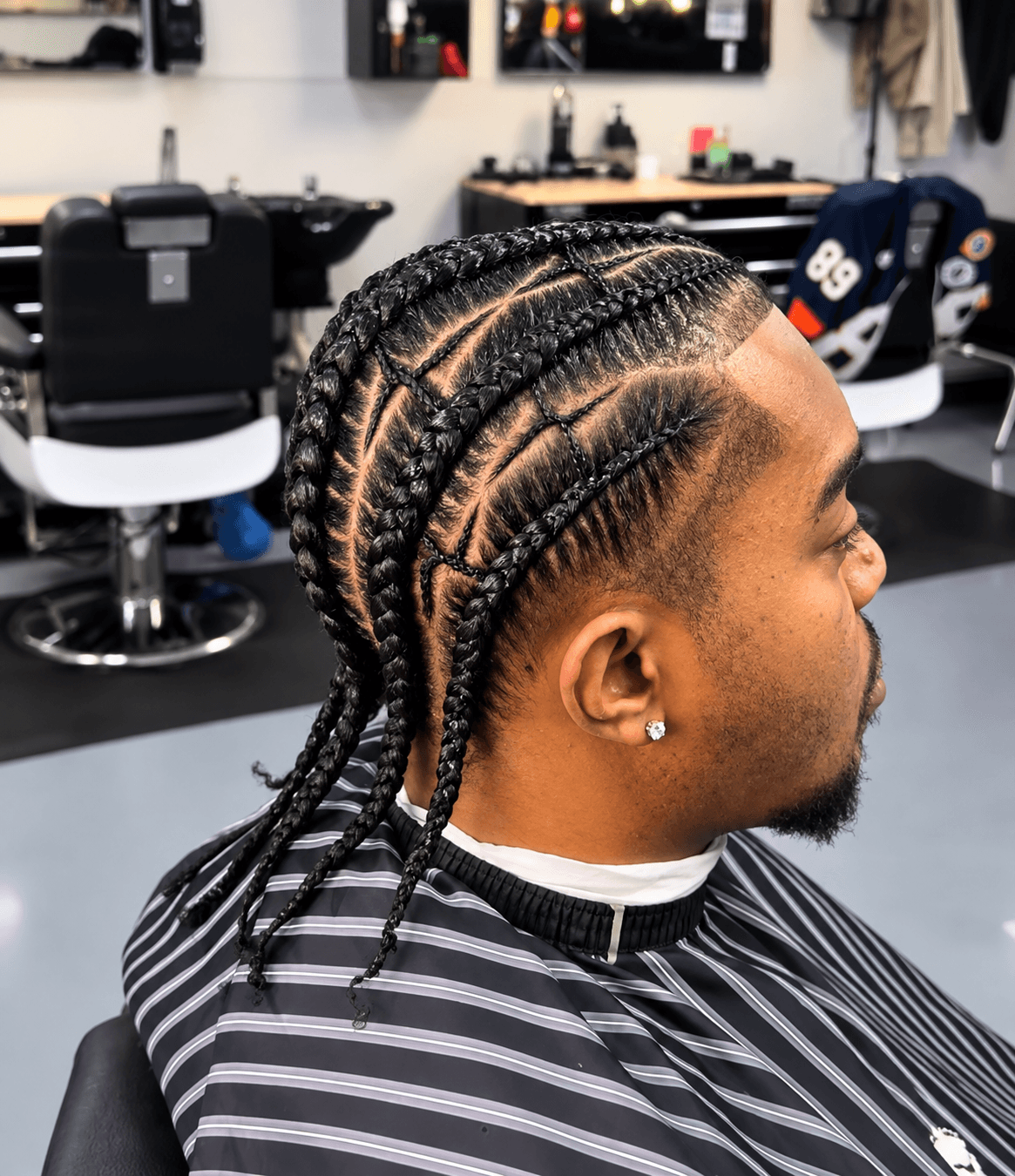 design braids by aranesa at Crowd Pleezers Barbershop